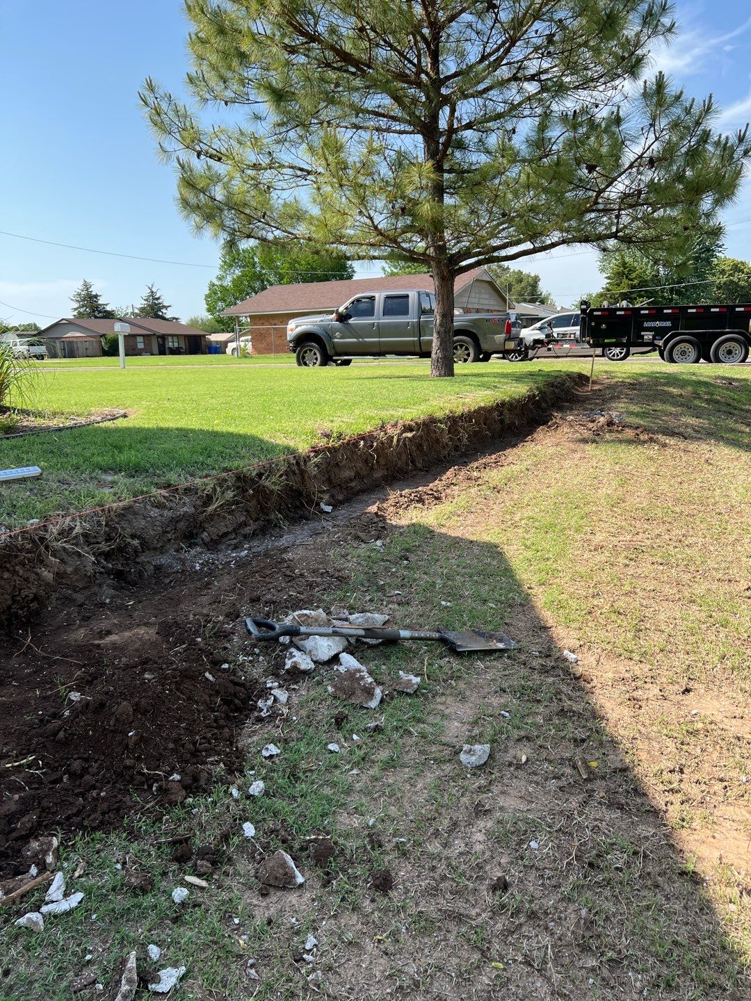 Retaining Wall using Rocks by Clays Services Inc