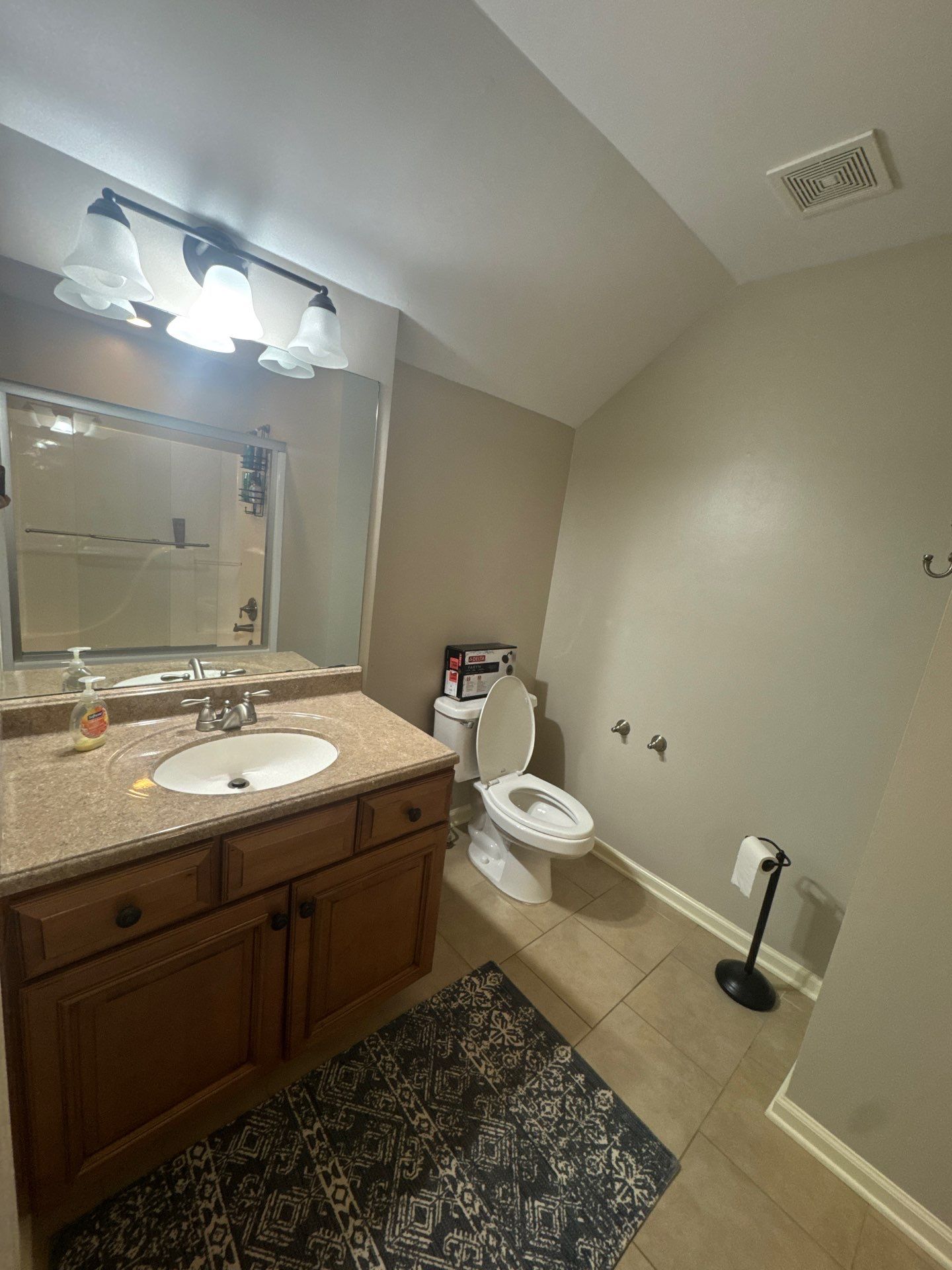 Modern Bathroom Transformation With Marble Patterned Tile in Powder Springs by Swift Home Renovations