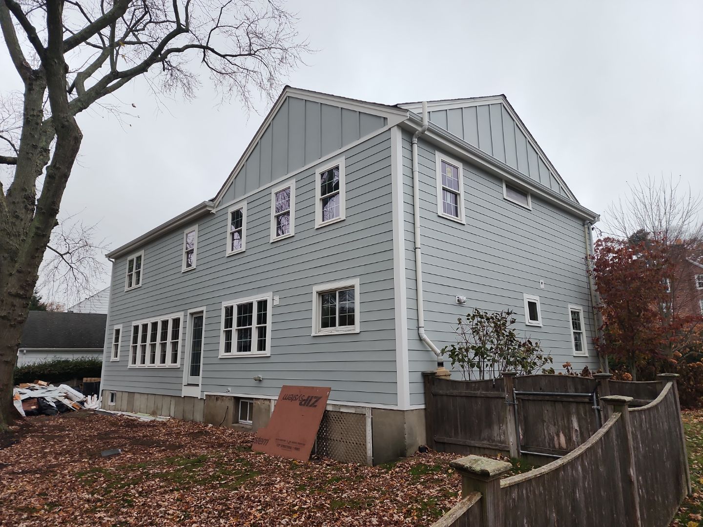 Siding and Roof for house with new addition in Milton, MA by UBrothers Construction