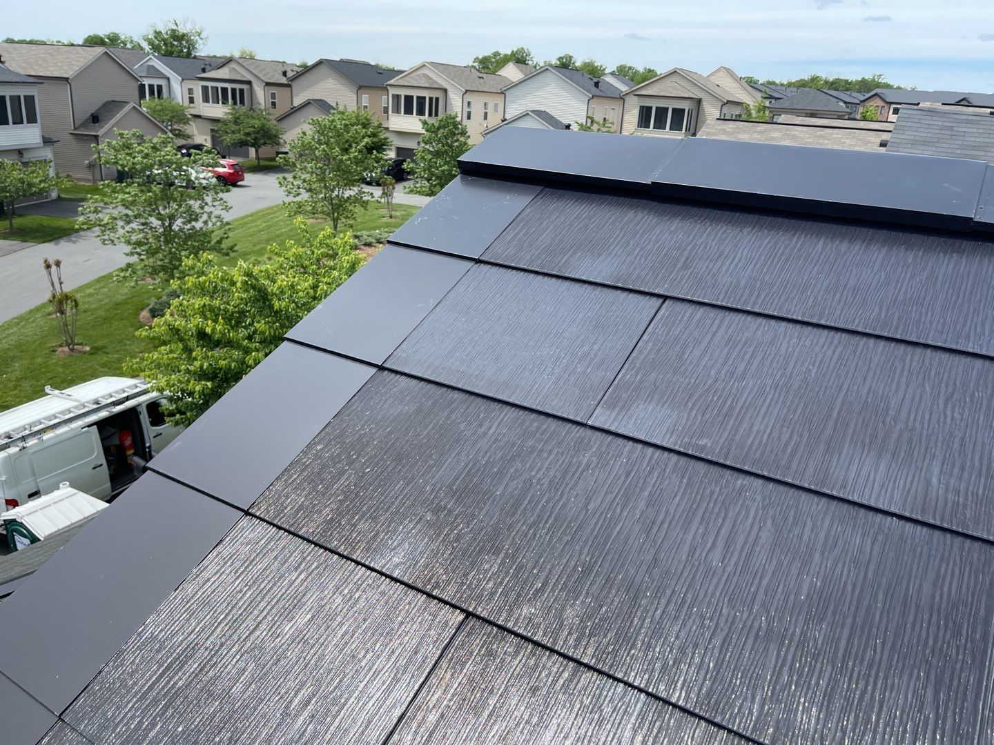 Tesla Solar Roof using Tesla Solar Roof V3 tiles by American Home Contractors