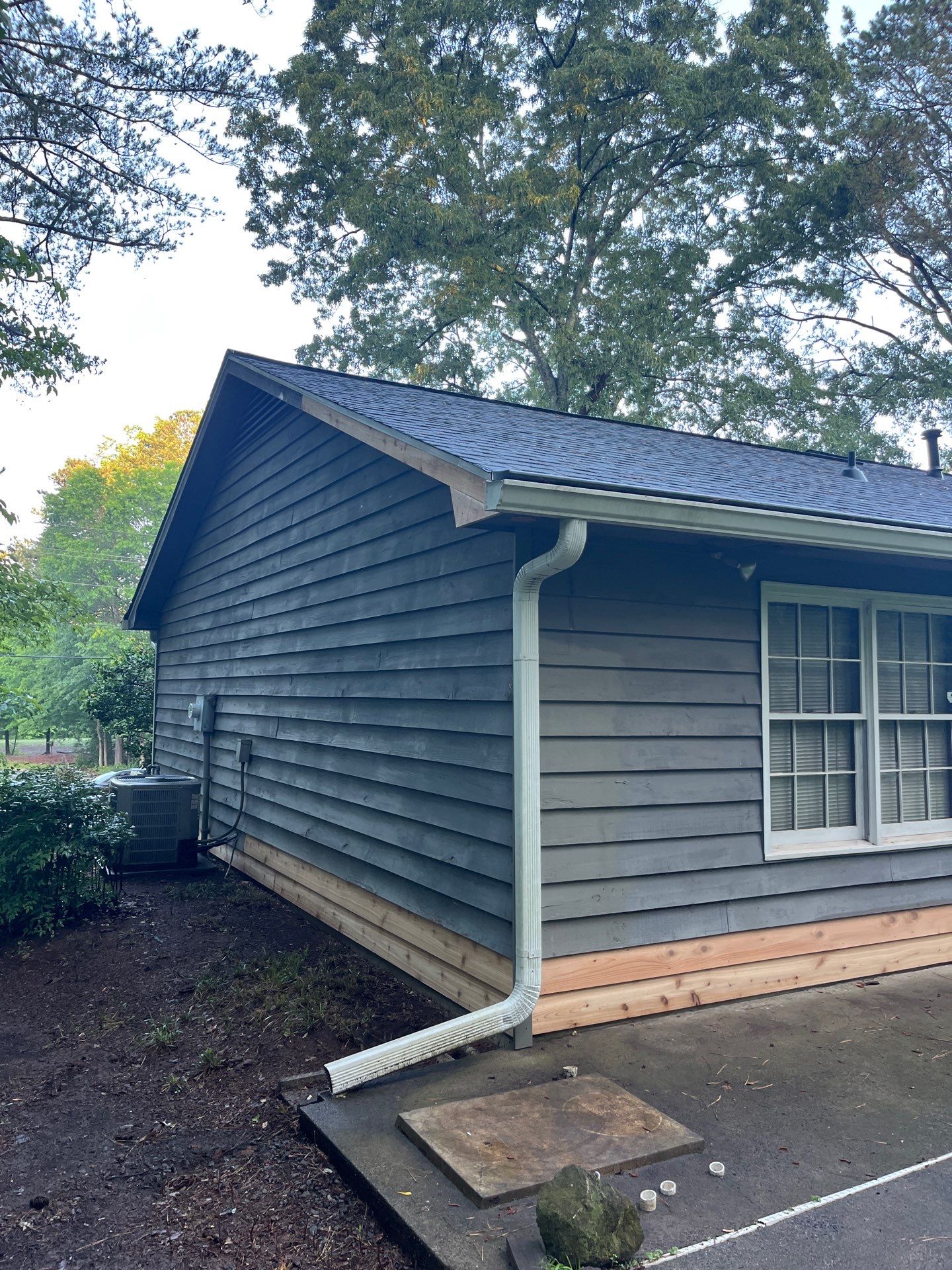 Marietta, GA Exterior Painting Transformation with Blue Paint by Nelson Exteriors