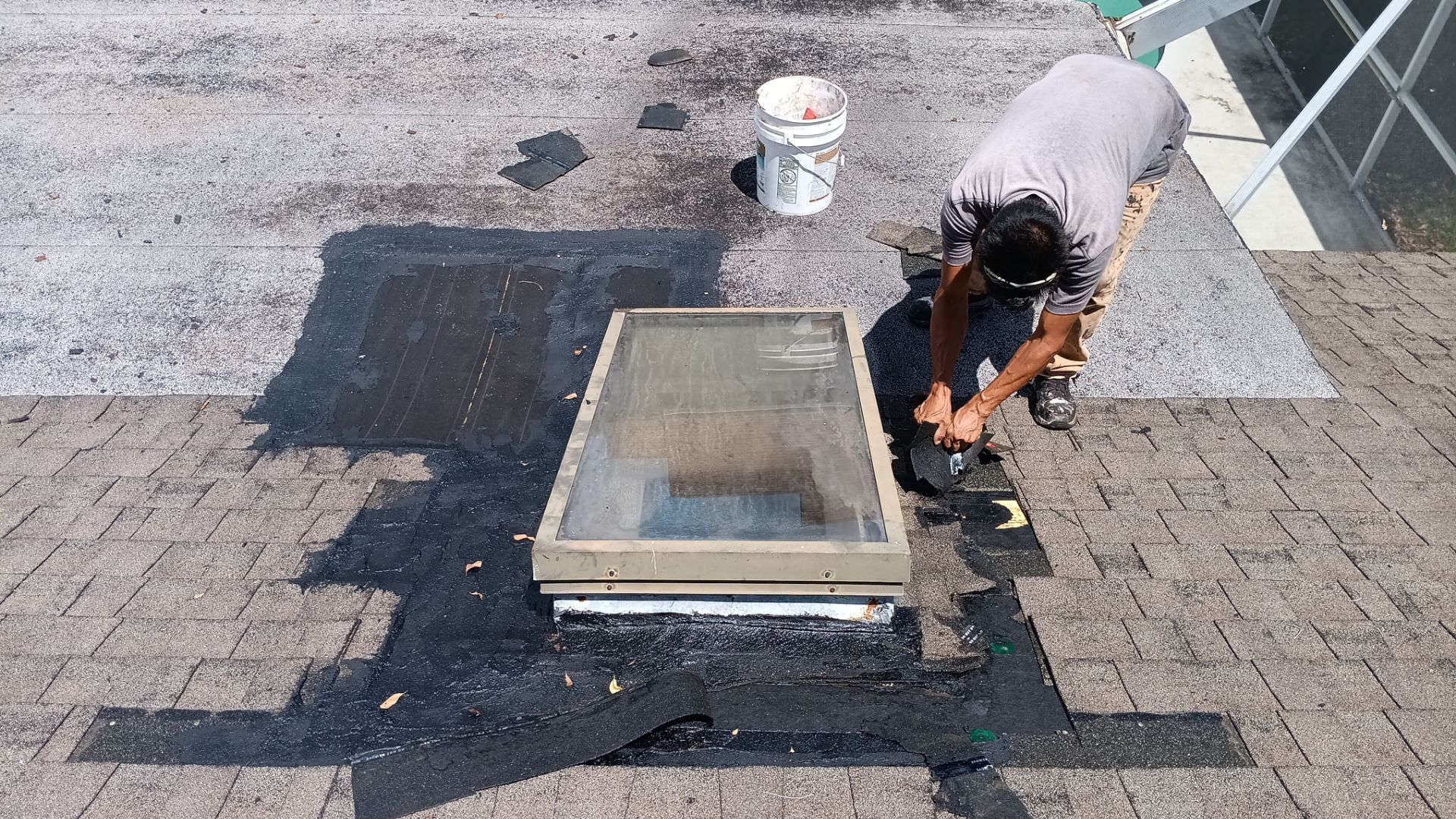 REPLACE NON APPROVED SKYLIGHT ALONG WITH CLOGED GUTTER by Morton Roofing, Inc.
