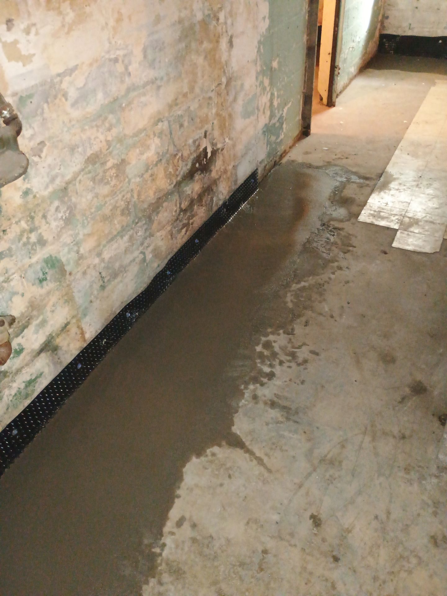 Interior Drain Tile for a South Minneapolis Basement by Waterproofing Northeast