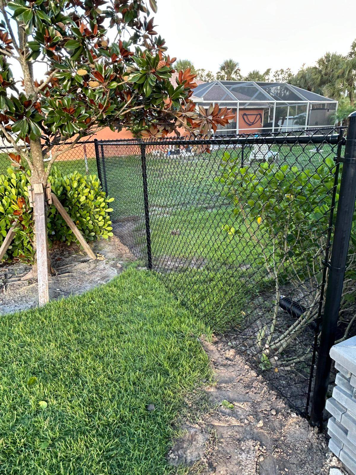 White Vinyl Privacy Fence and Chain Link Installation in North Port by True Fence LLC