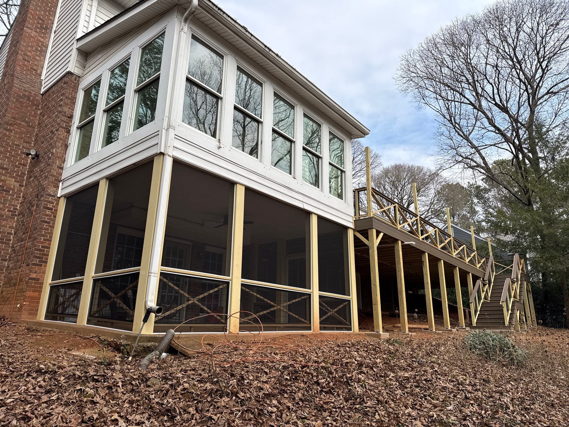 Deck Build and Screened-In Porch Install with Wild Hog 6' Black Mesh Panel Railing by Nelson Exteriors 