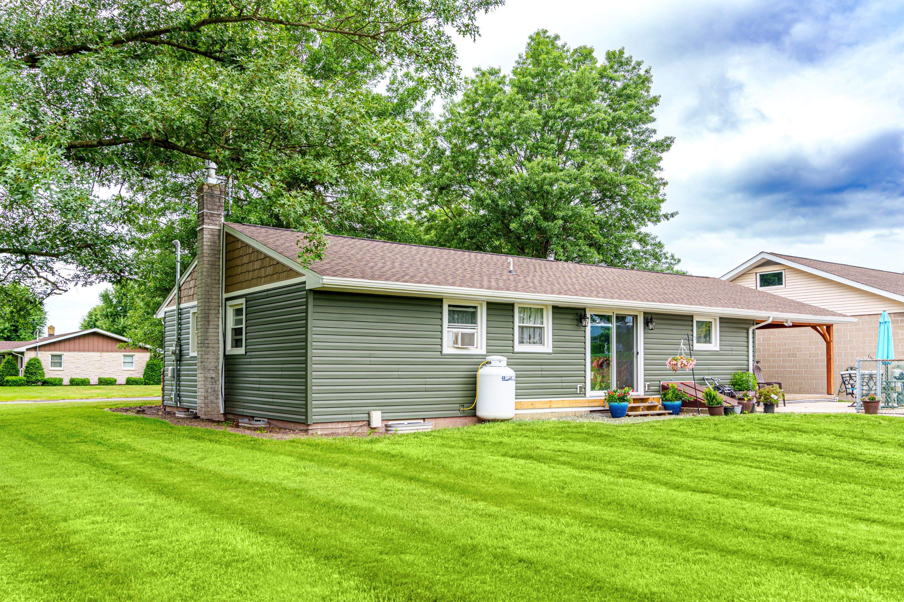 Shingle Roof- new siding- entry door by Esh Builders