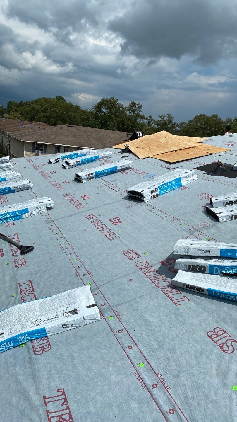 Commercial Roofing Installation using Roof Replacement by American Roofing & Construction LLC