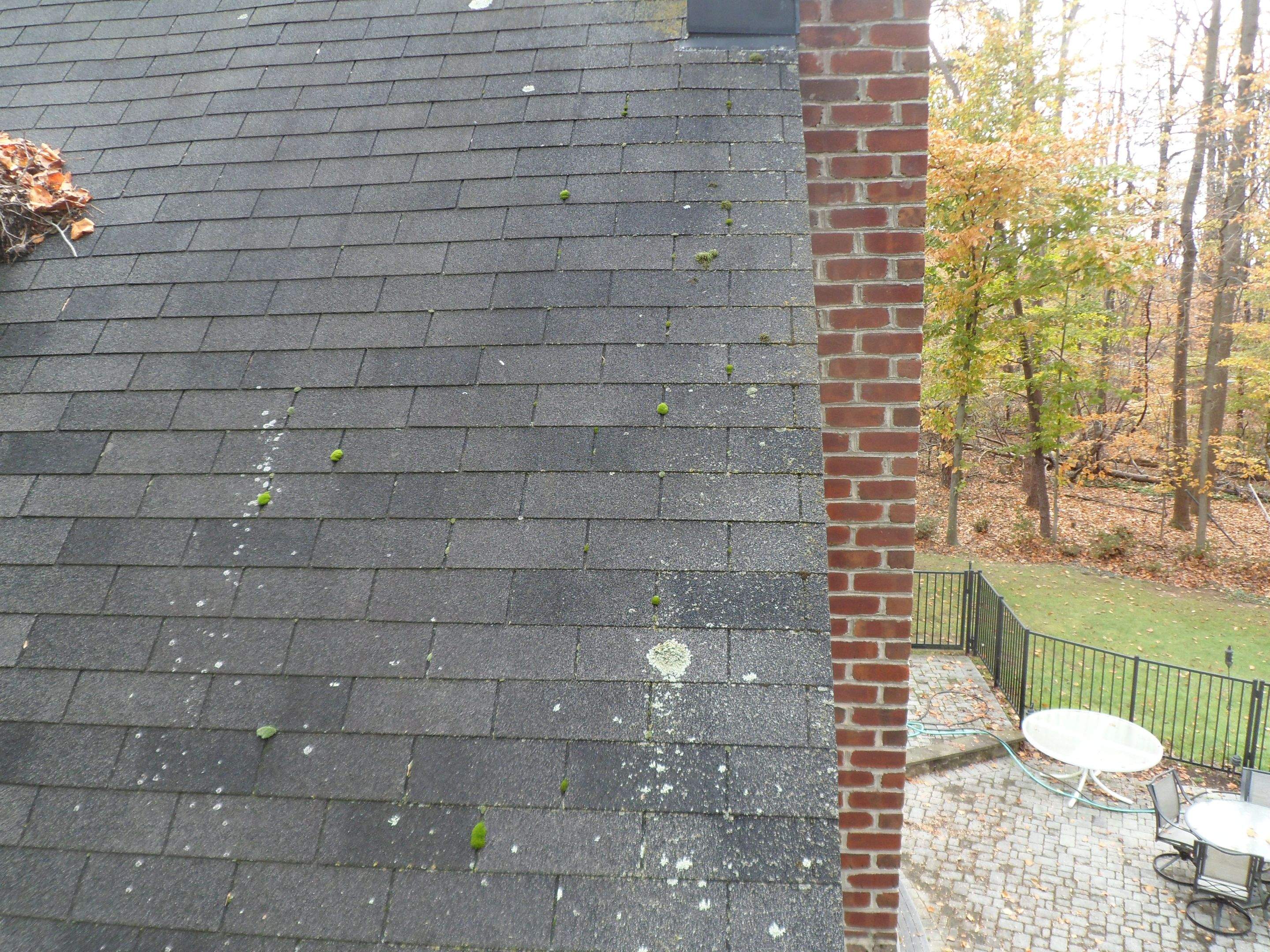 Residential Roofing Installation using Charcoal Black by Alpha Design Services