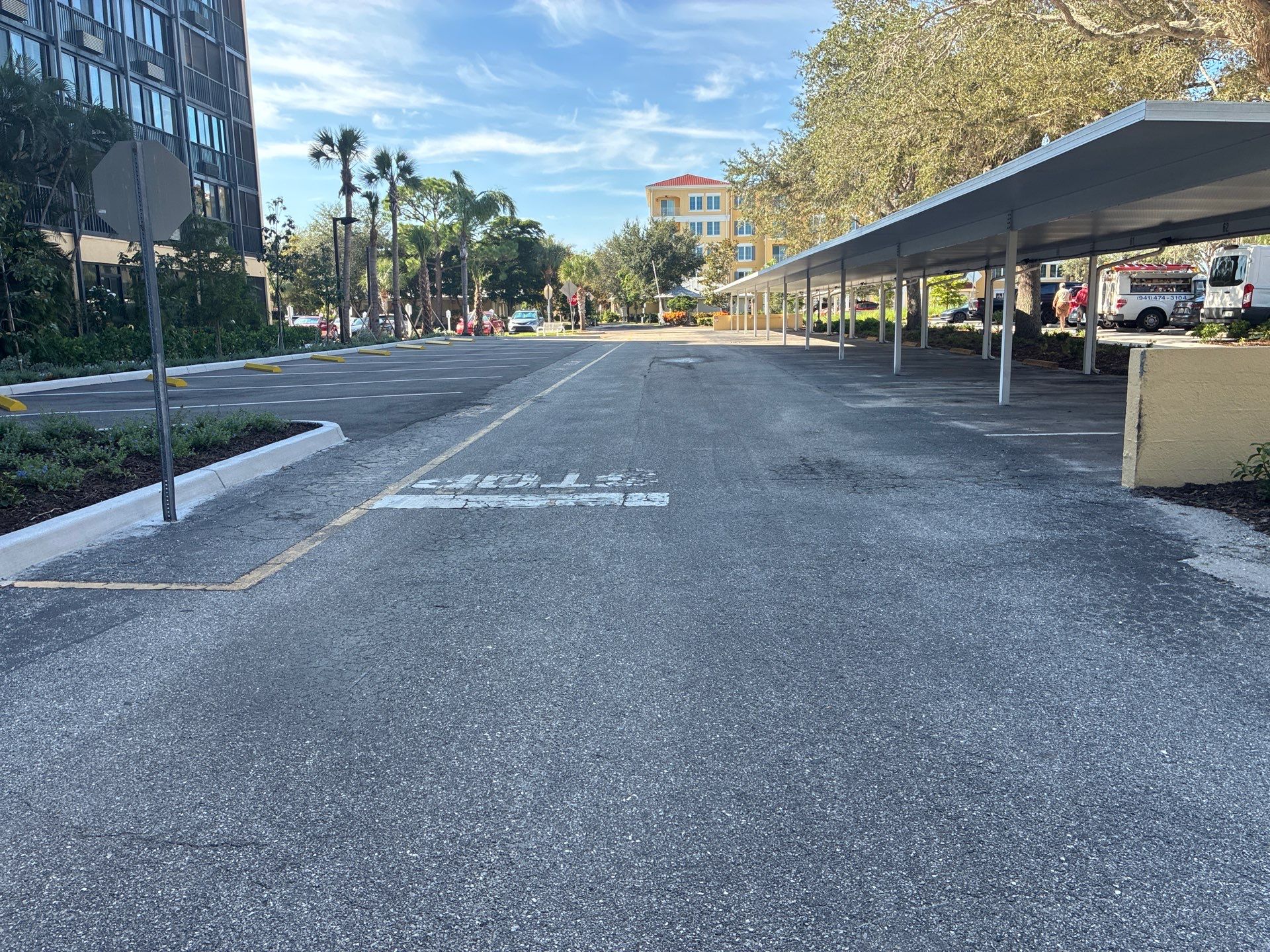 Comprehensive Parking Lot Mill and Overlay with Custom Line Striping in Venice by Everline Coatings & Services - Southwest FL