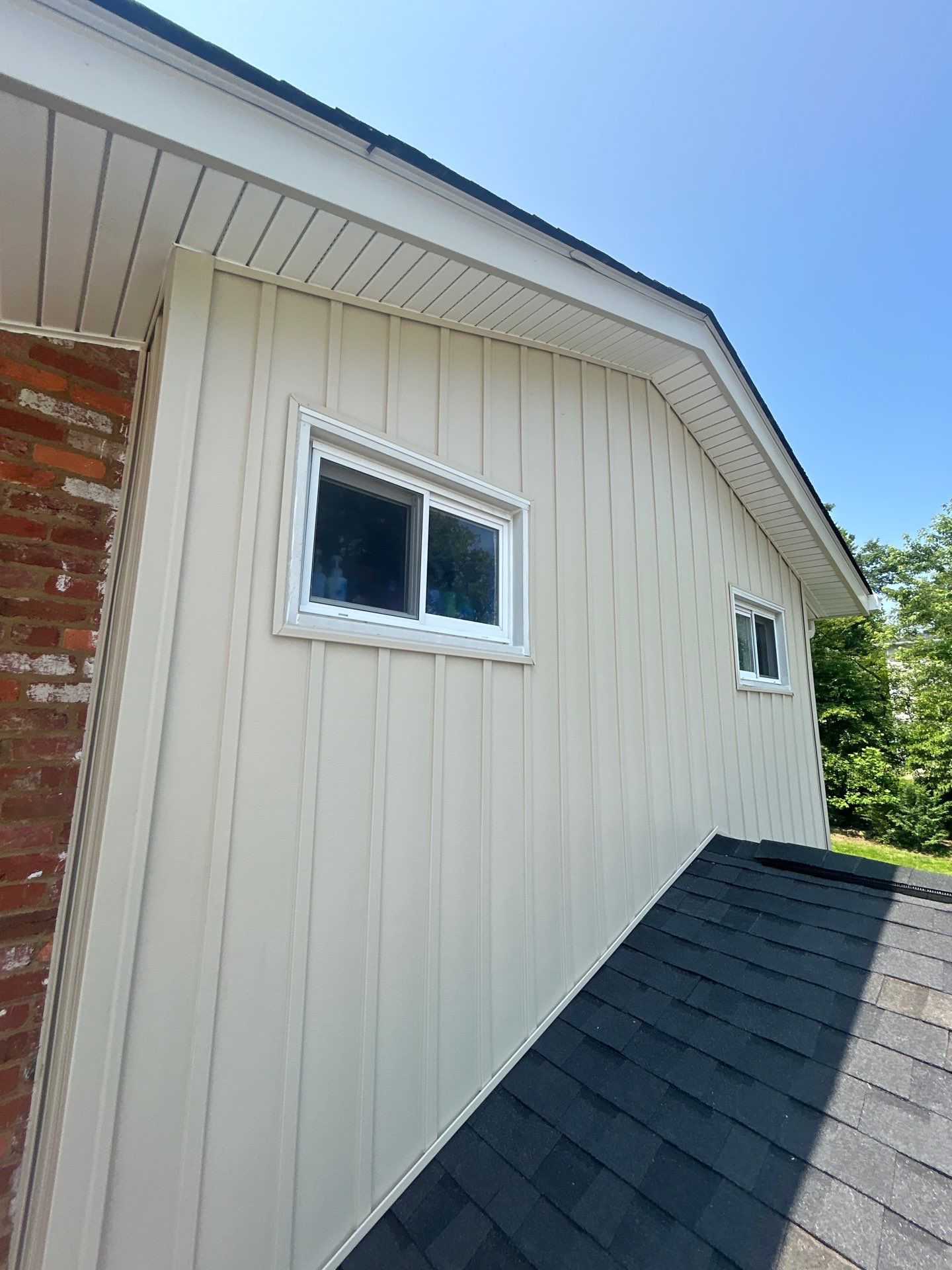 Fairfax: Residential Siding Replacement with CertainTeed 8" Board and Batten Siding in Desert Tan by RM Banning, Inc.