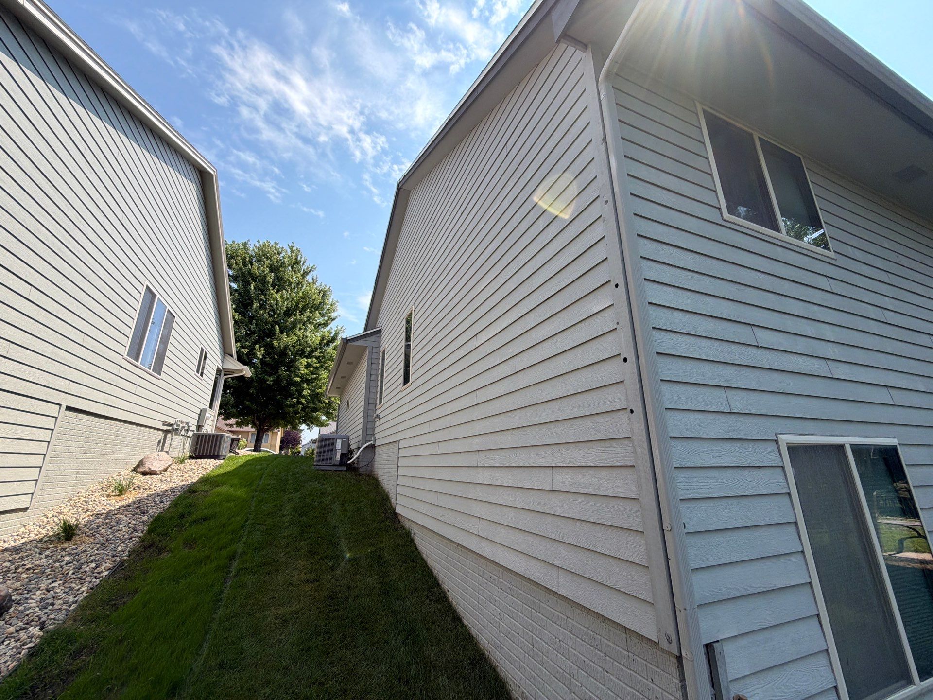 Exterior Painting for Vinyl Siding and Trim in Sioux Falls by Select Painting, Coatings & Garage Cabinets