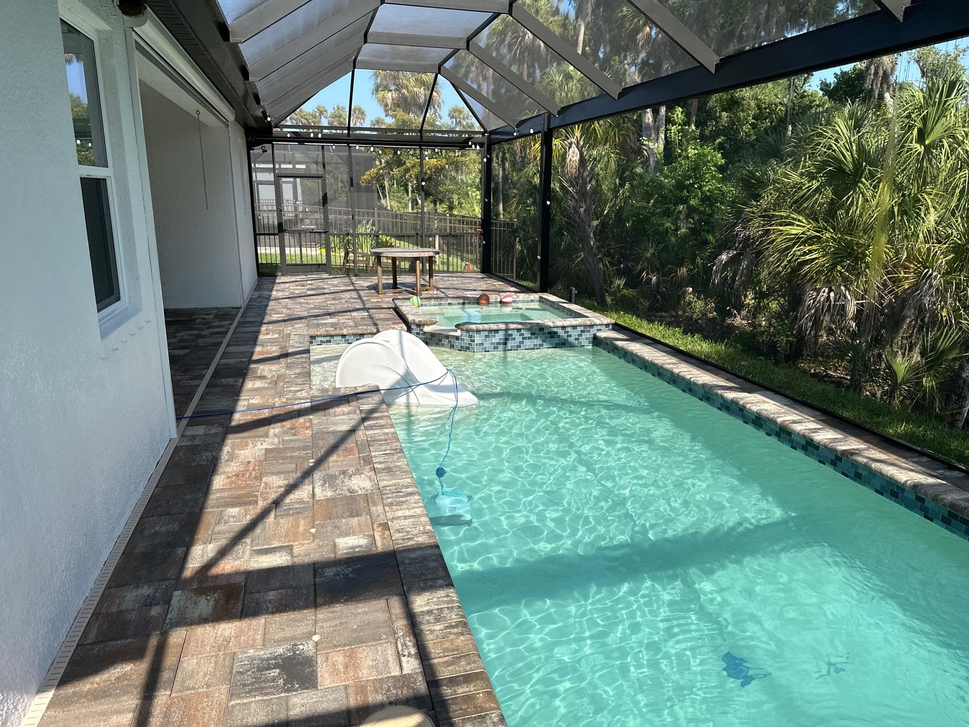 Screen Enclosure & Paver Pool Deck Cleaning in Trevesta Community, Palmetto, FL | Sunshine AquaWash by Sunshine AquaWash