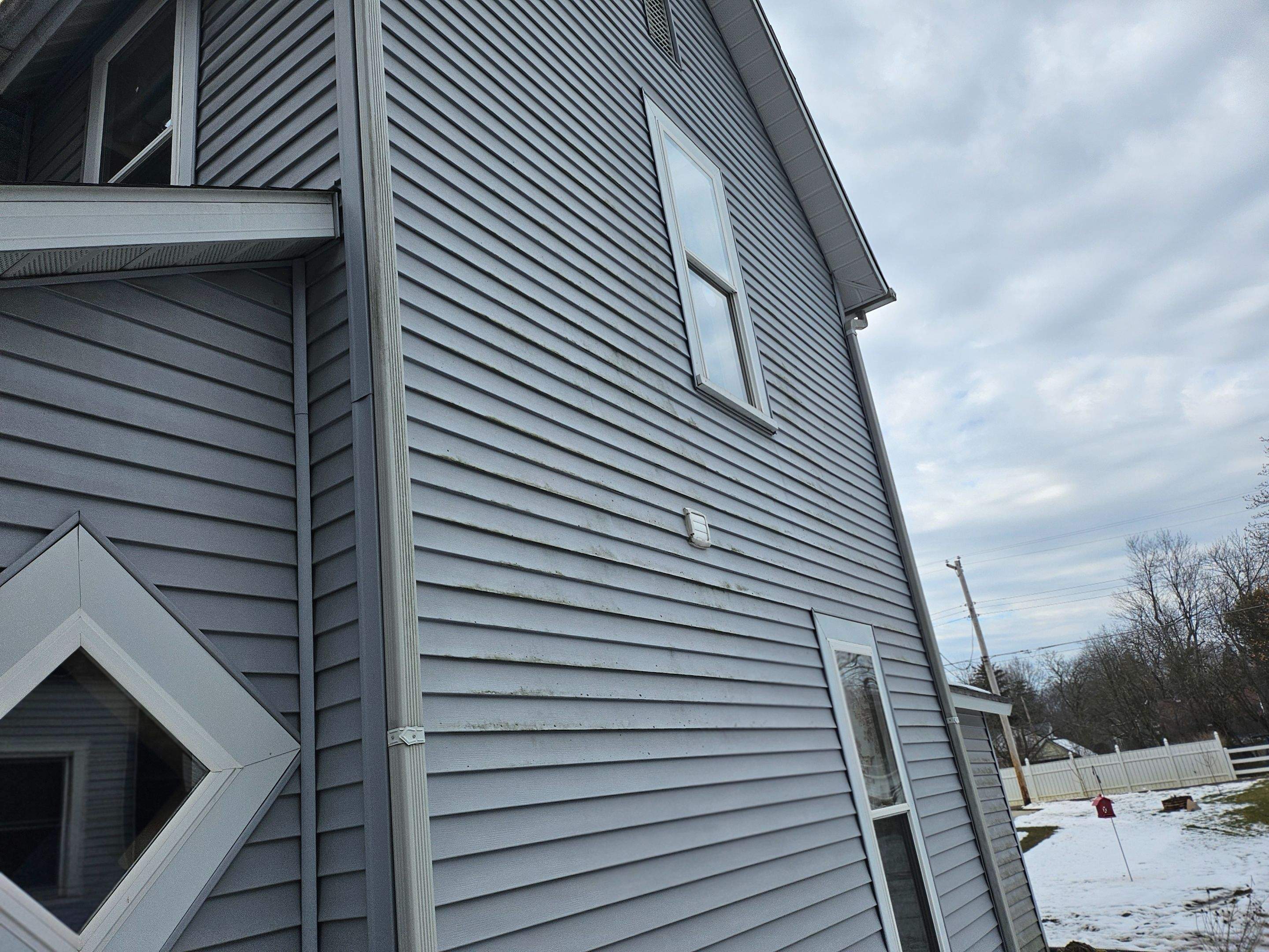 Exterior Makeover using Norandex Siding by Energy Plus Home Improvements