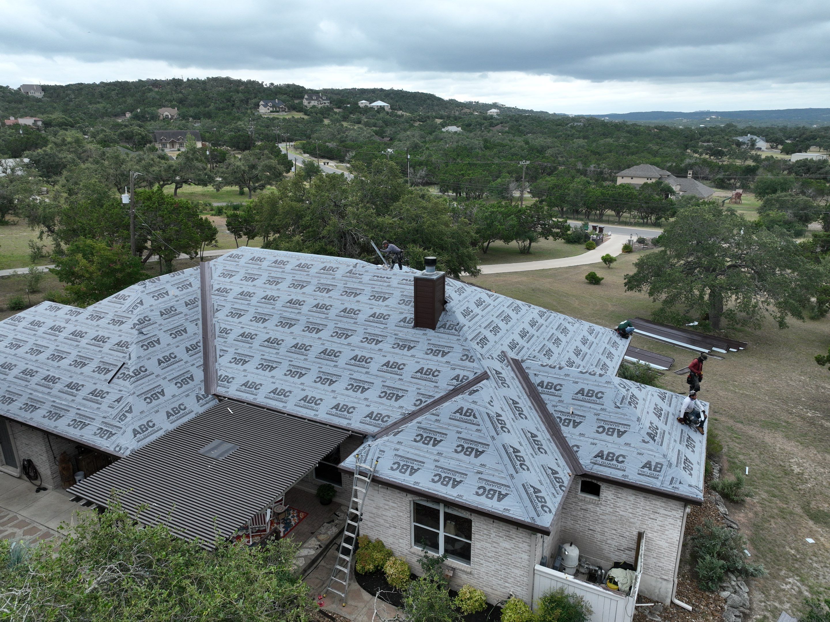 Residential Metal Roof Installation using McElroy Metal by Premier Roofing and Contracting
