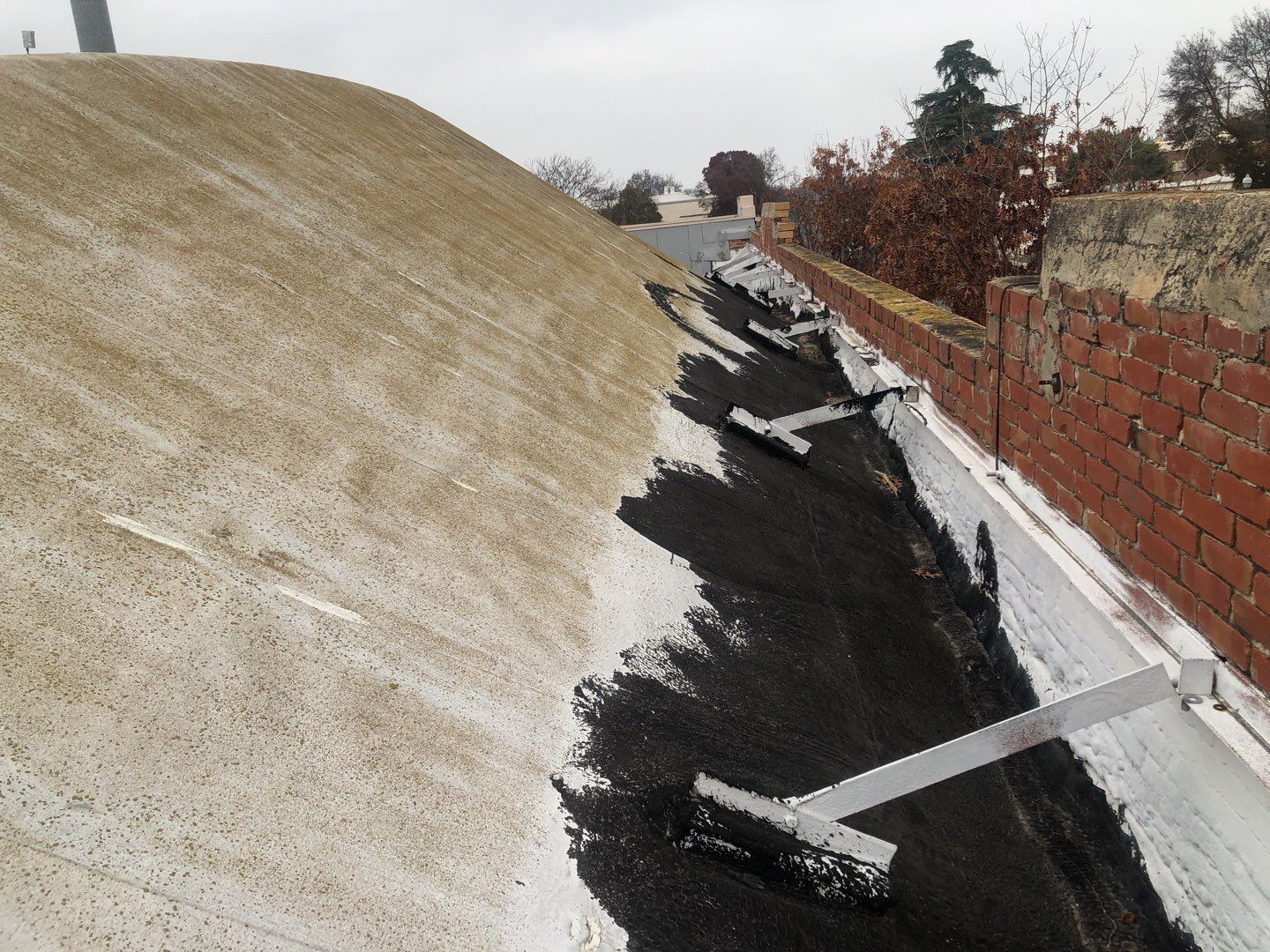 Spray foam and coatings using Conklin Benchmark/PUMA XL coatings and spray foam by Straight Edge Roofing Inc