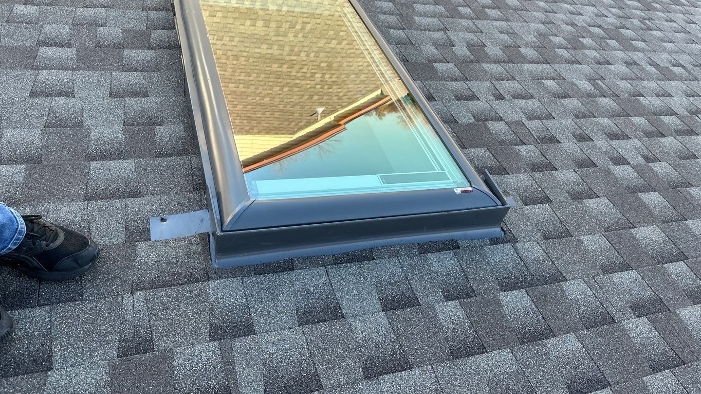 roof, skylight, and vent replacement in Edmond by McCann's Roofing and Construction