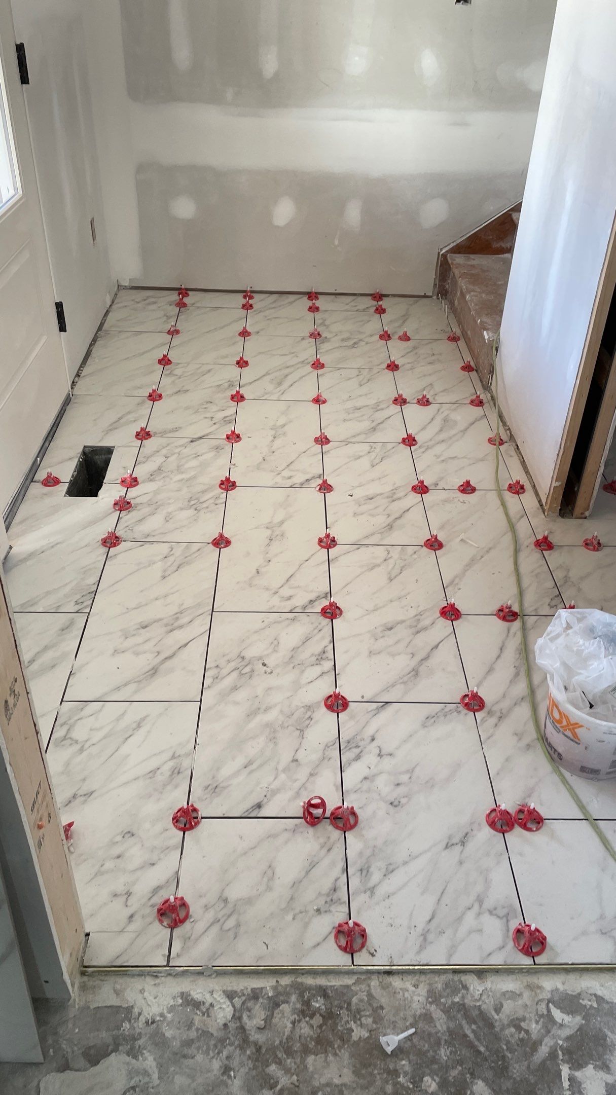 Remodeled Home with new tile floors, Showers and Refinished Oak Floors with stain and Waterbased Finish by Footprints Floors of Coastal Carolina