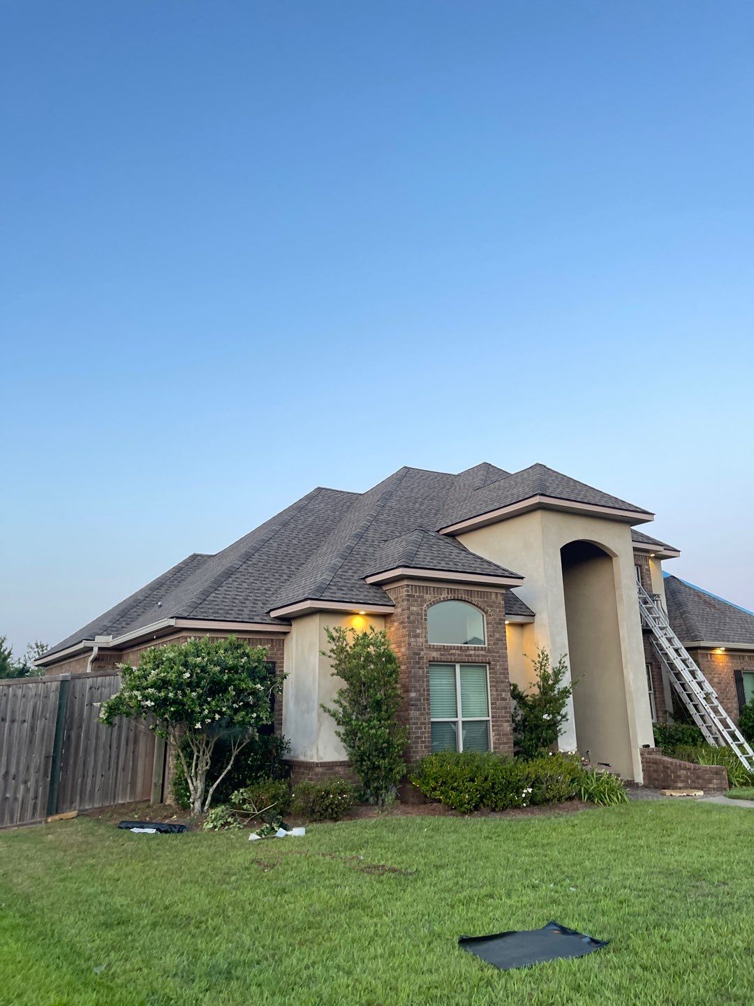 Residential Roofing Installation using Roof Replacement by American Roofing & Construction LLC