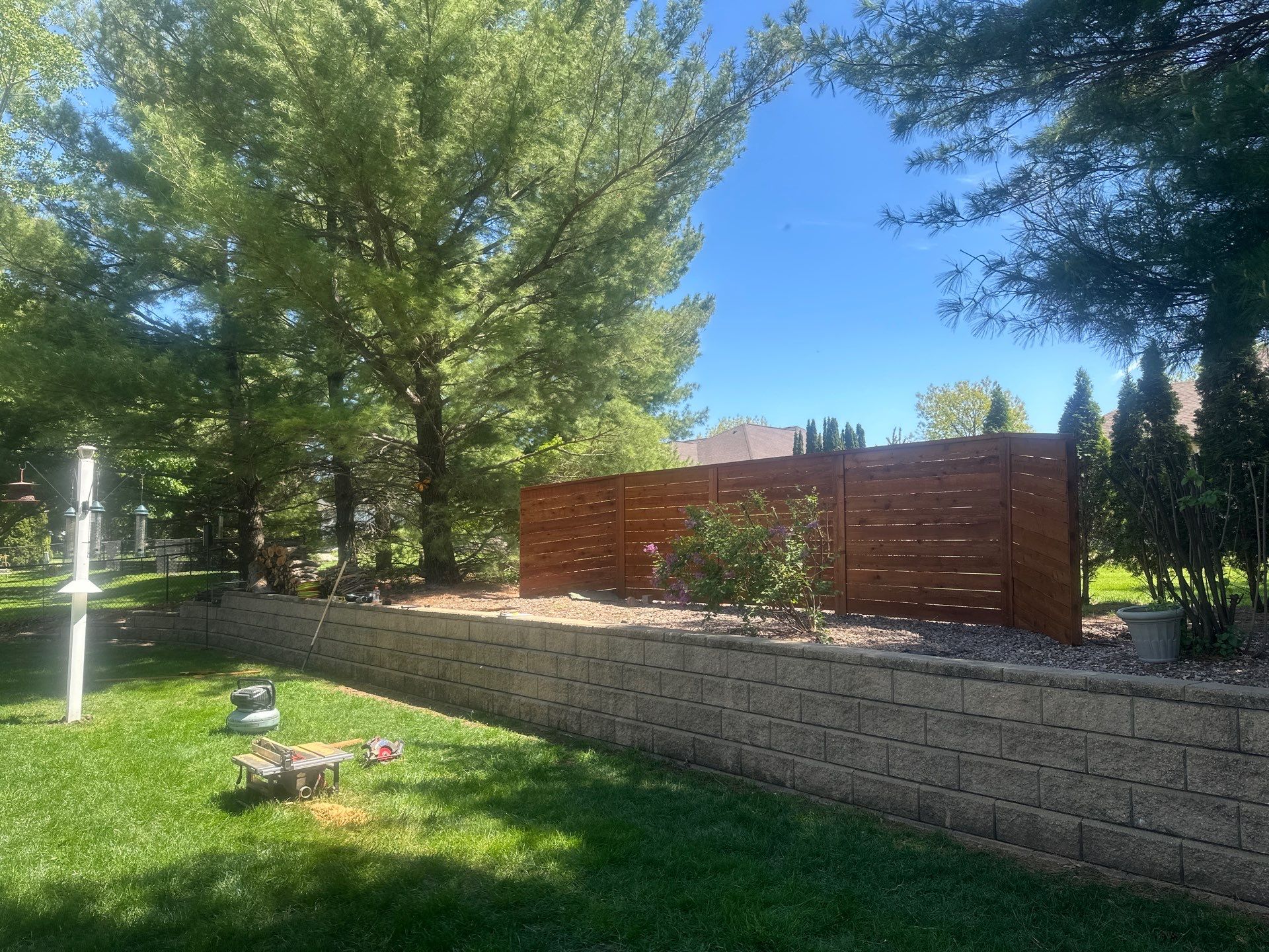 Horizontal Stained Wood Privacy Fence Installation in Waterloo by Perfect Picket Fence and Stain