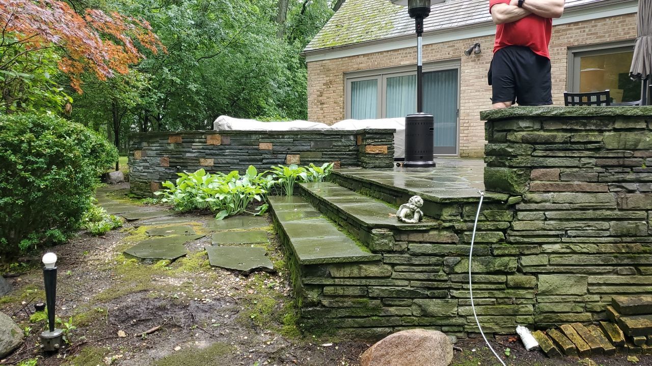 Bluestone patio cleaning by Northern Power Washing LLC.