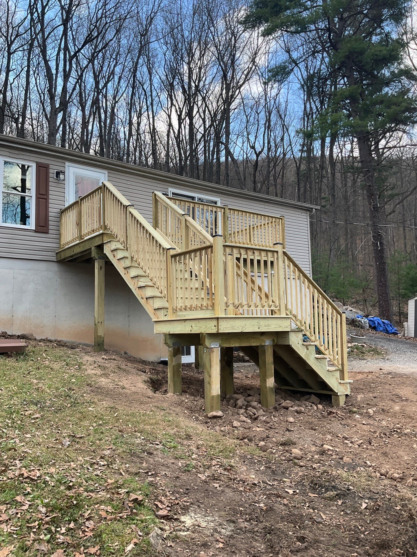 Pressure-Treated Deck Replacement by Esh Builders