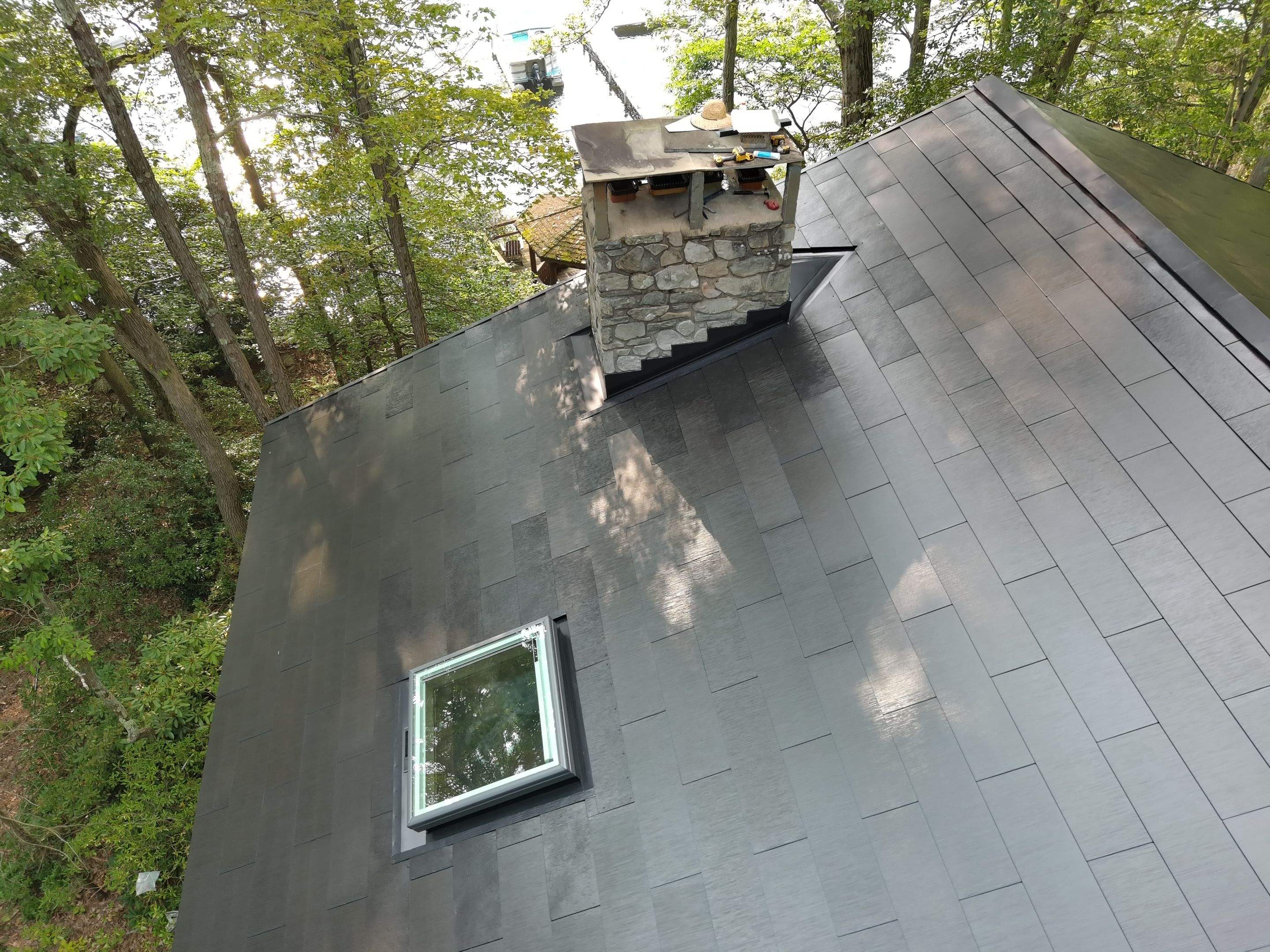Stunning Tesla Solar Roof Cabin in the Woods by American Home Contractors