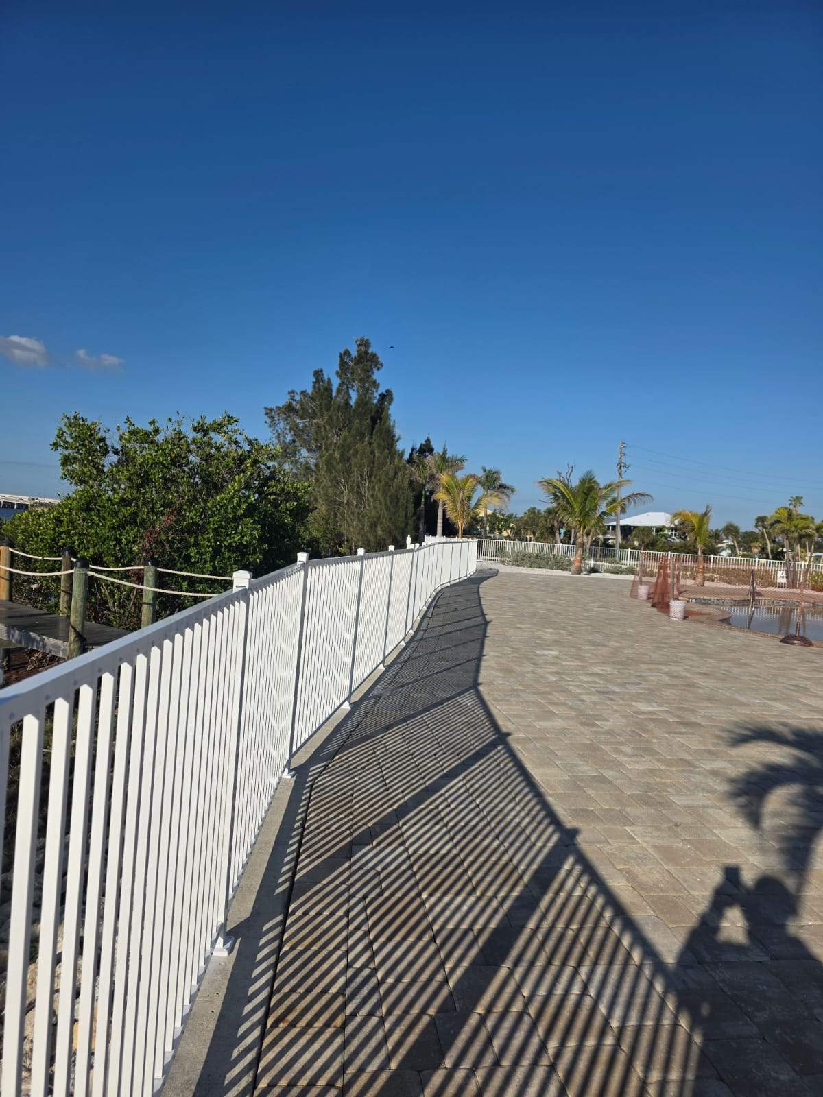 White Aluminum Railing Installation for Commercial Property in Port Charlotte by True Fence LLC