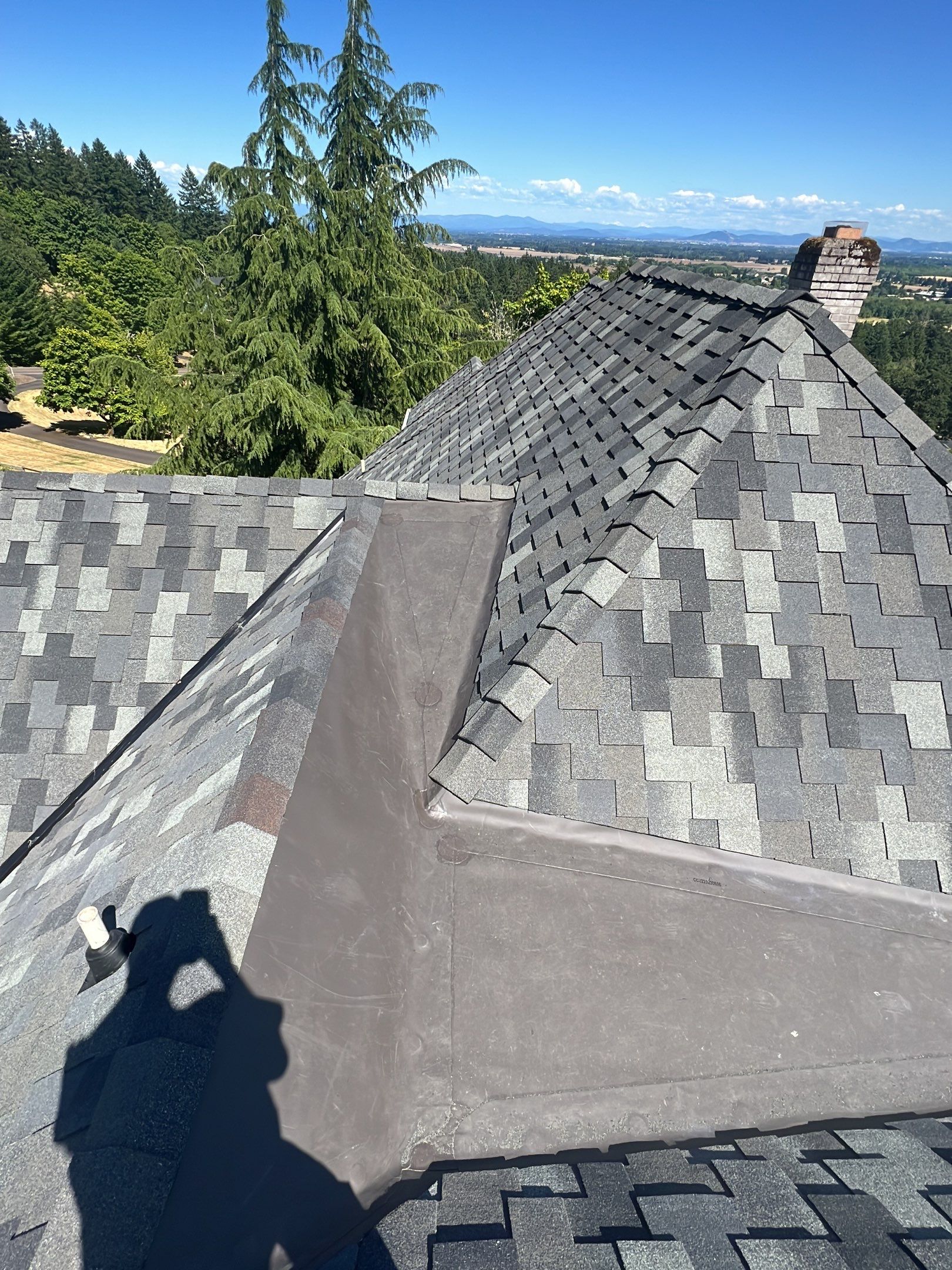 Residential Roofing Installation using Malarkey Windsor 50 Year Shingle (Color: Storm Grey) by Orezona Building & Roofing Company, Inc.