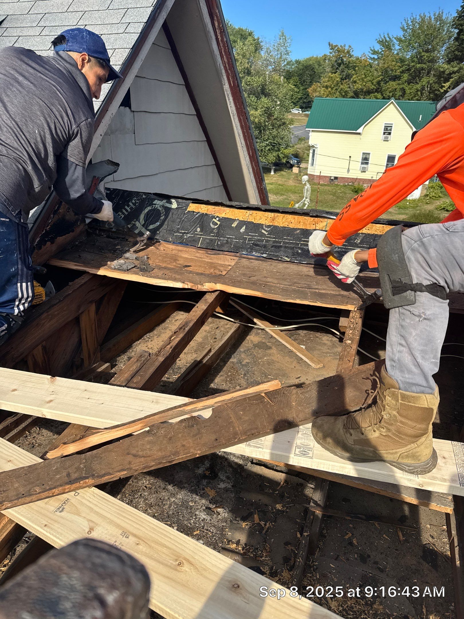 Dormer Reconstruction and Rubber Roof Repair - Manchester NH by Compass exteriors