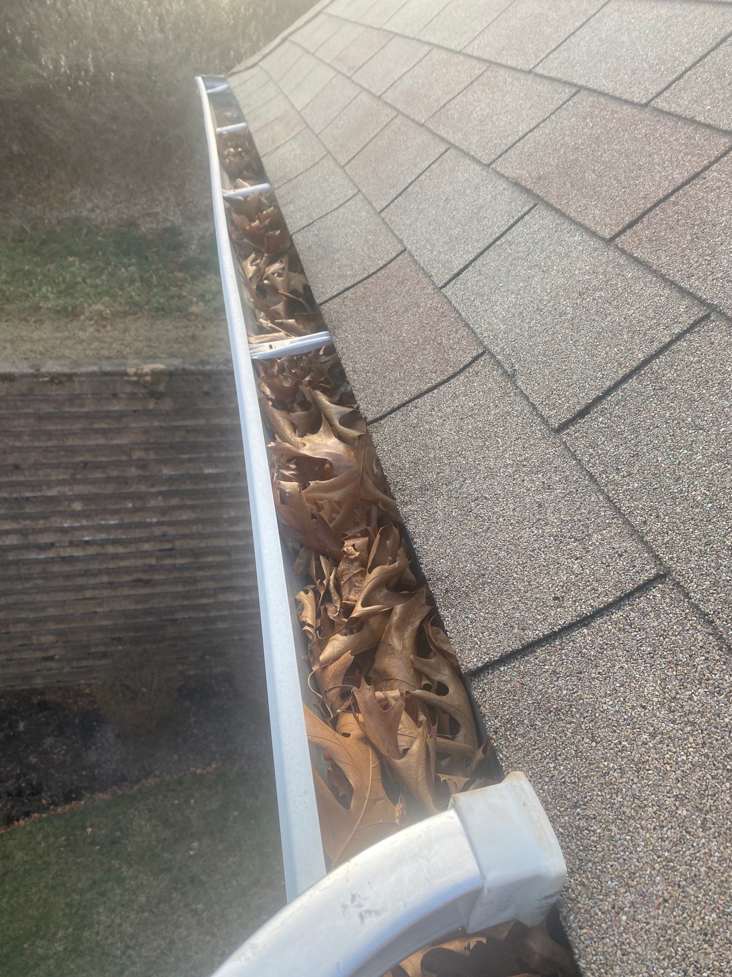 Commercial gutter cleaning Allentown & Bethlehem before photo with filled gutters