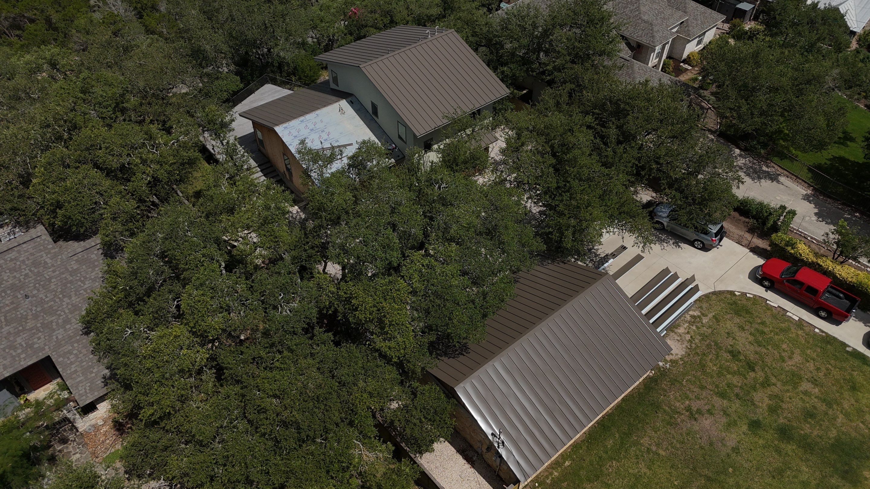 Residential Roof Replacement using 24 GA Double-Lock - Medium Bronze by Action Exteriors Austin