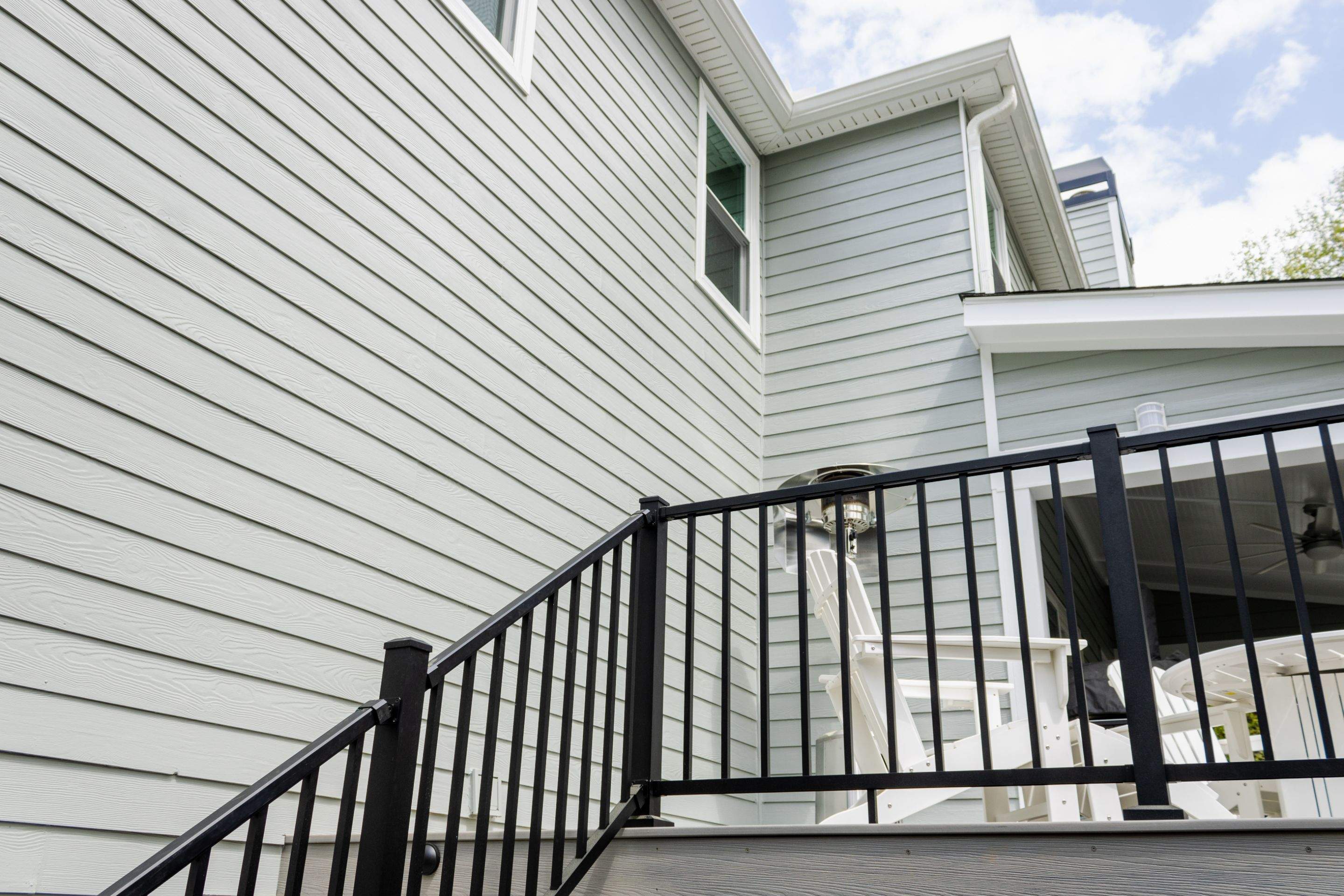 Covered Porch and Deck Build using Deckorators Venture Series Decking and Trex Select Aluminum Railing by Nelson Exteriors