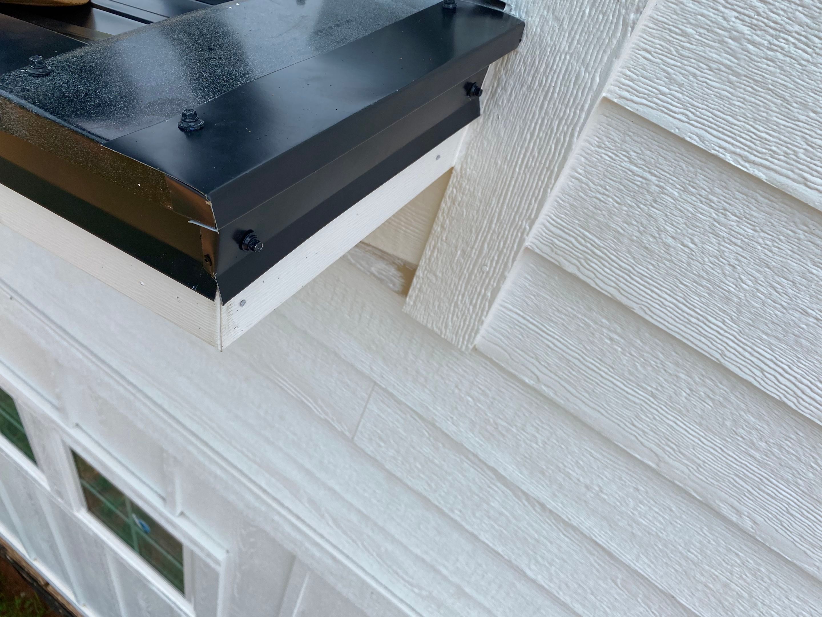 Jason's metal porch roof by BROCK BUILDERS 