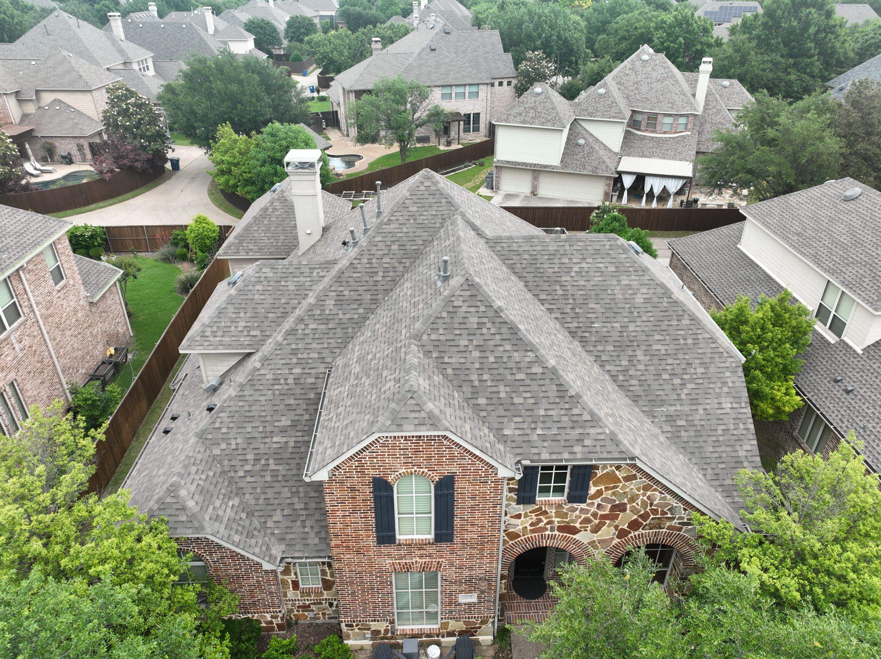 Residential Roofing Installation using Malarkey Highlander Weathered Wood Plus by OneSource Roofing and Restoration