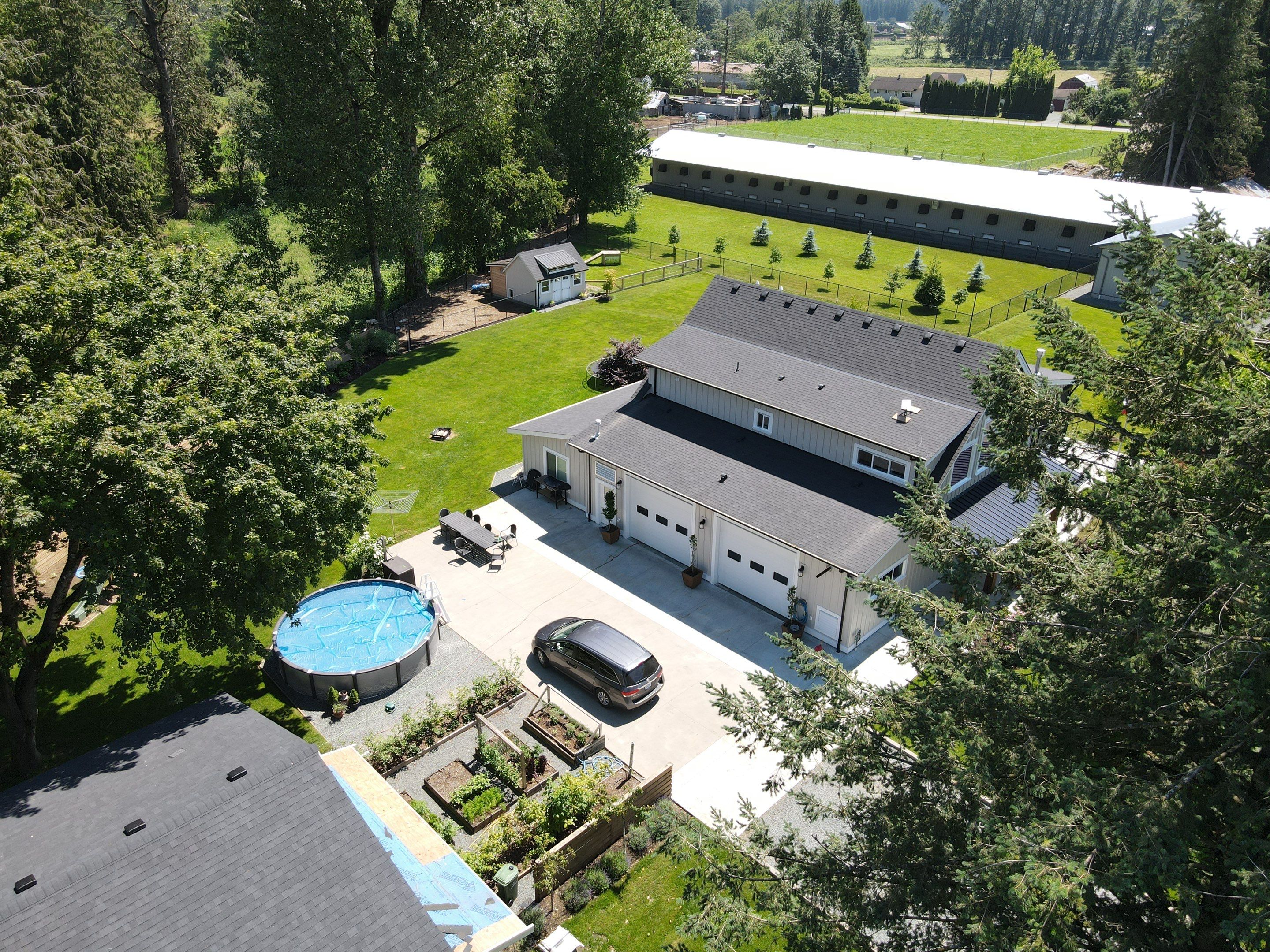 Residential Roofing Installation using 12" Prolok metal, shingles and Torch on roofing by Top Notch Roofing Inc