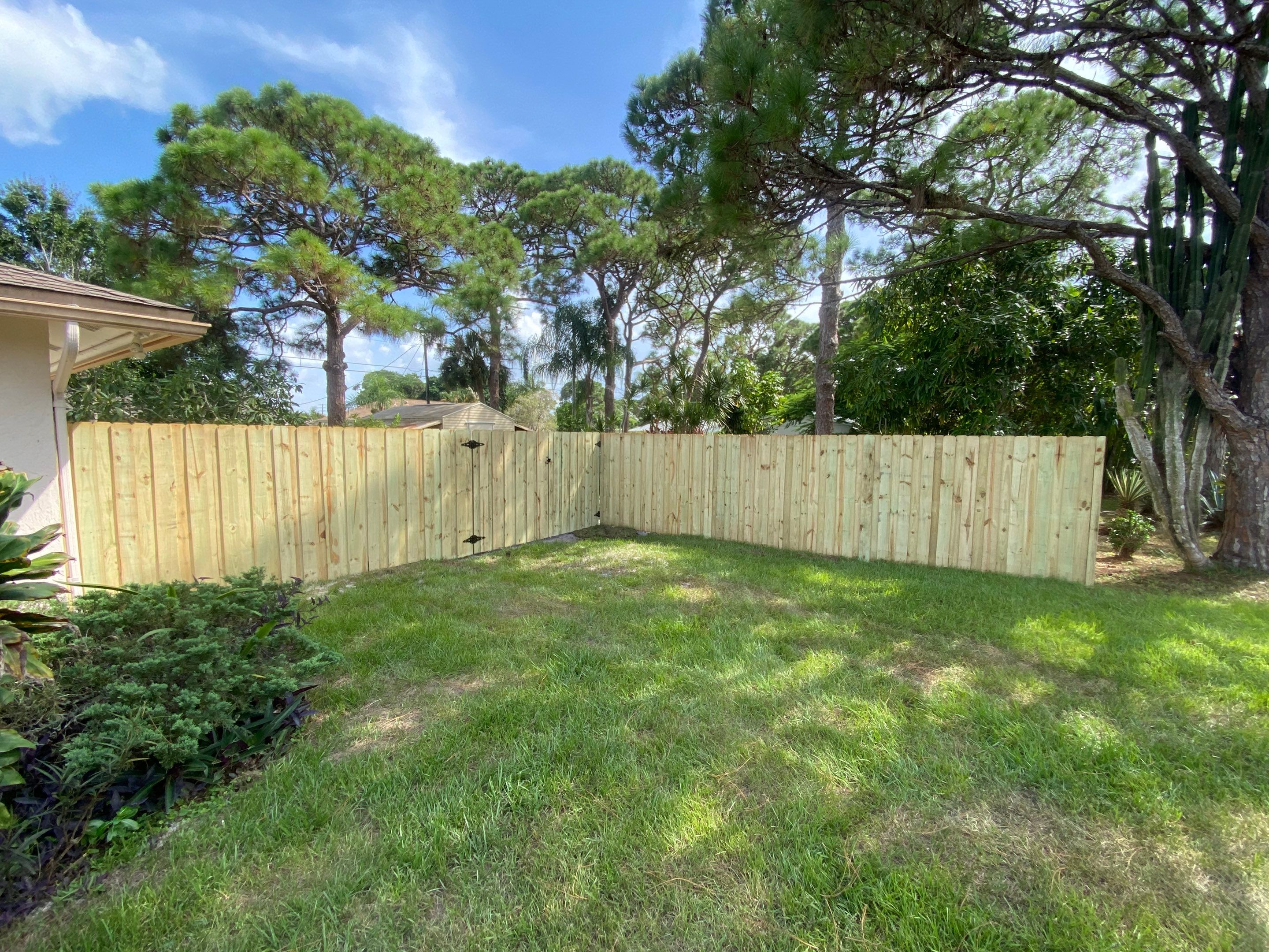 Wood Fence Installation using Board on Board Wood Fence by Asap fence and gates, LLC