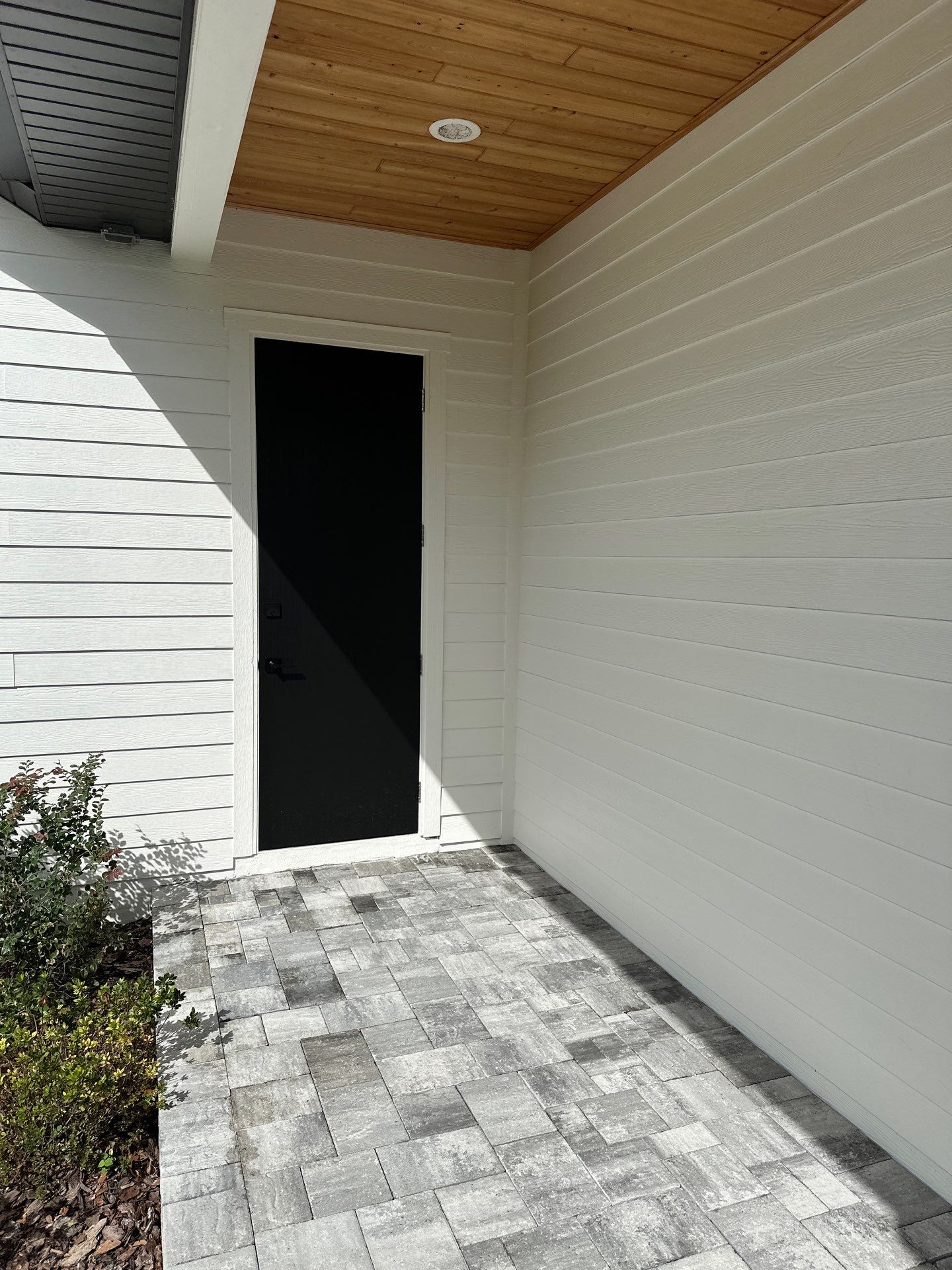 Complete Two-Story House Wash and Driveway Cleaning in Winding River Community, Bradenton, FL by Sunshine AquaWash