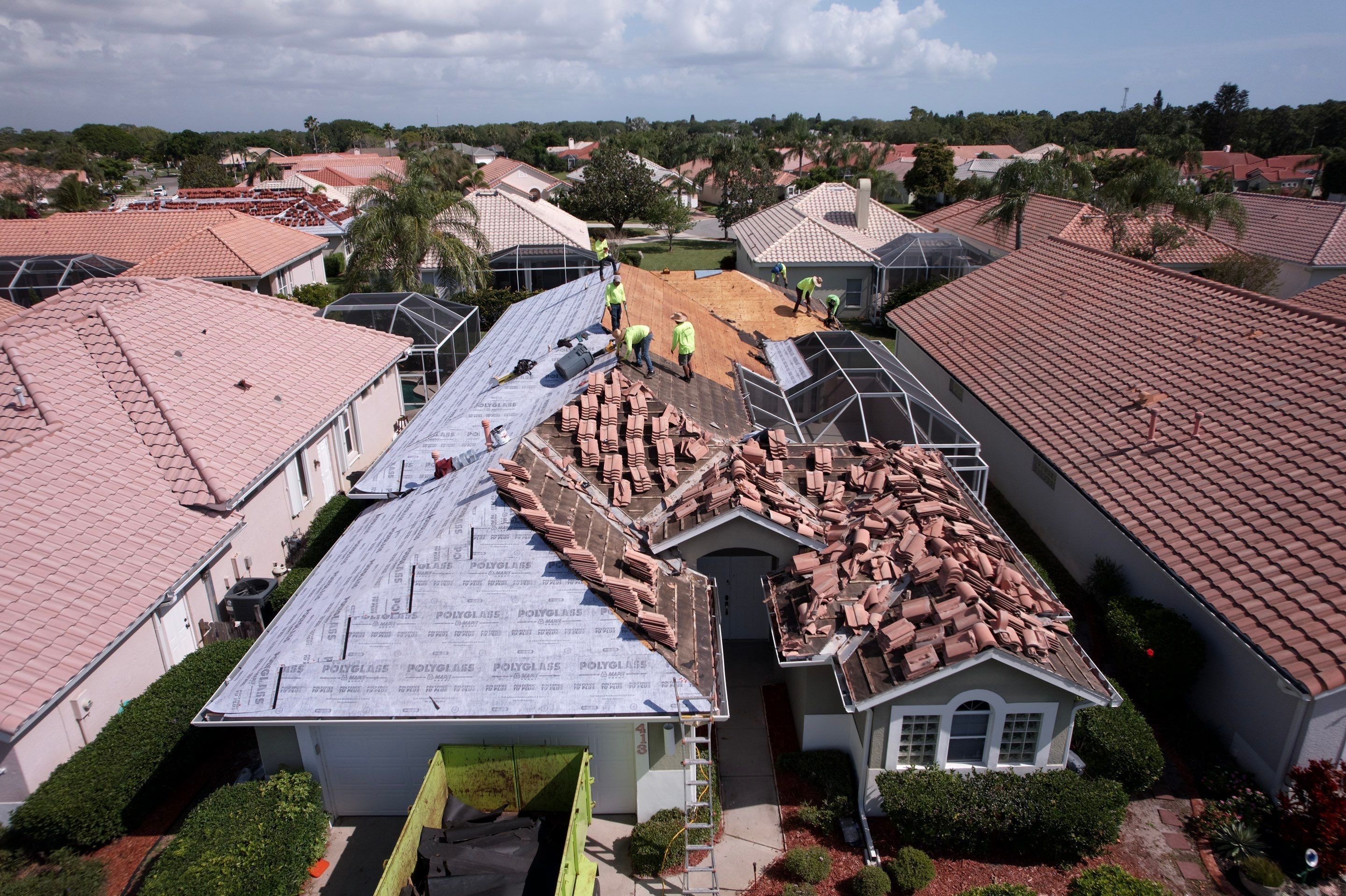 Tile Roof Replacement and Kona Red Range Installation in Melbourne by Wiedmann Construction & Roofing