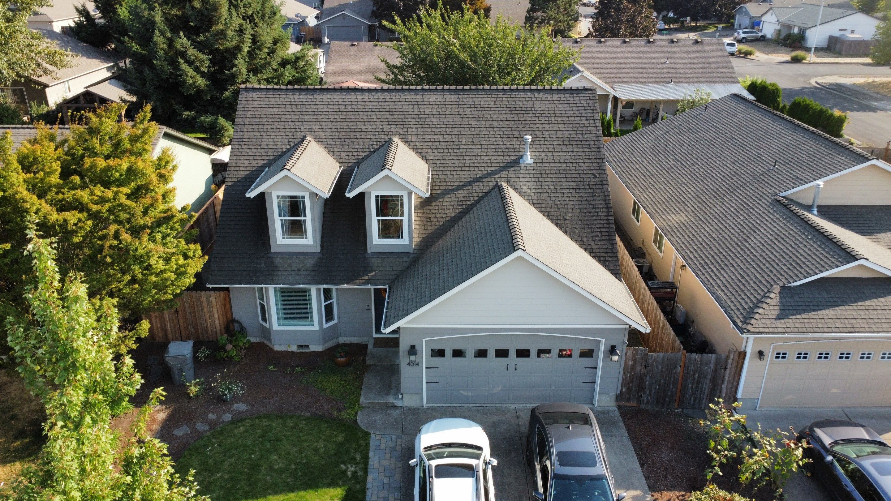 Granite Black Residential Roof Replacement by Orezona Building & Roofing Company, Inc.