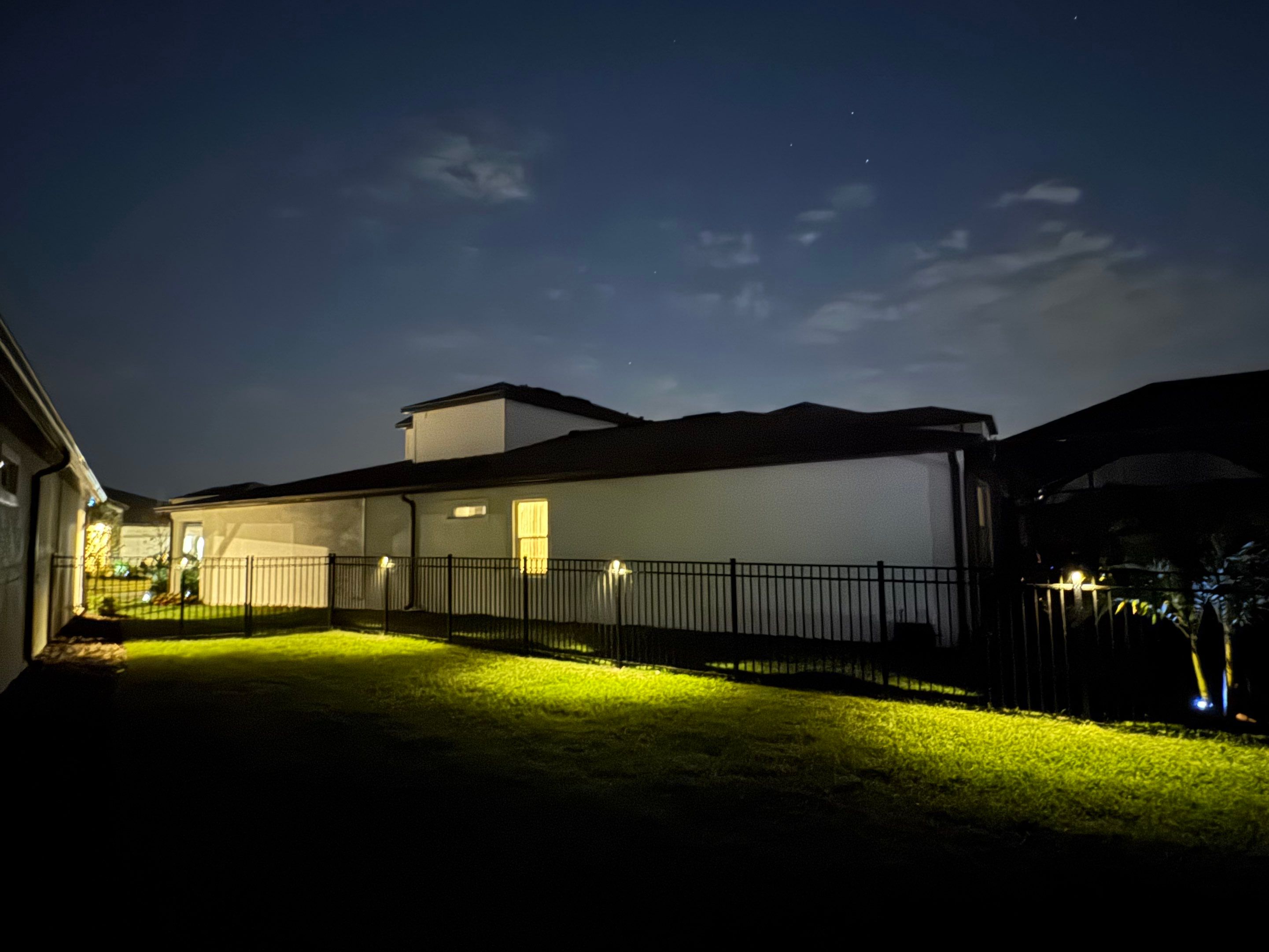 Custom Landscape and Pool Enclosure Lighting Installation in Apollo Beach by Elegant Accents