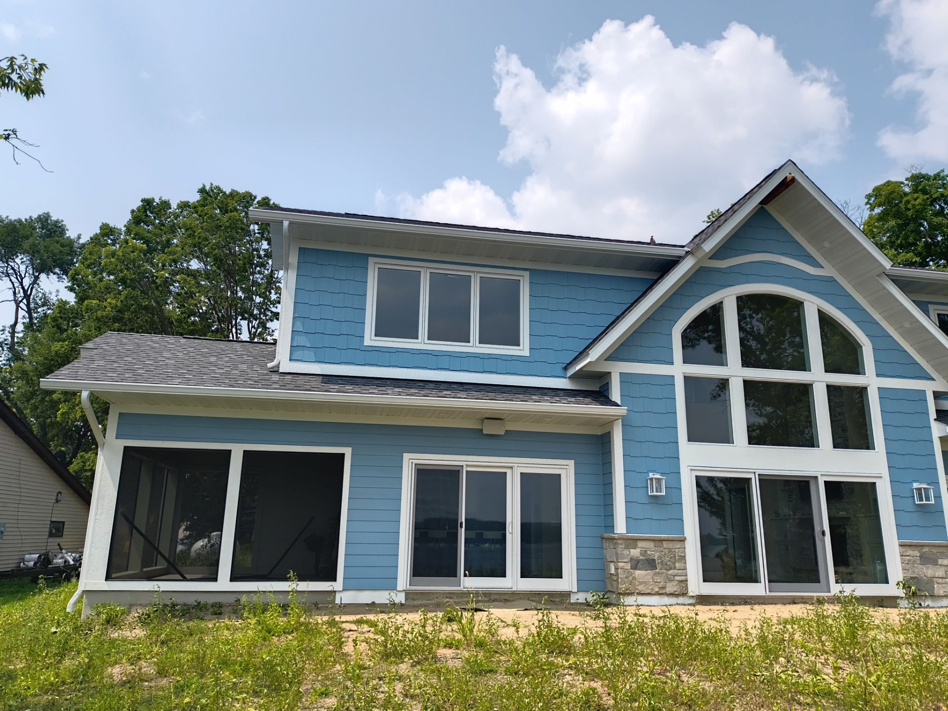 White Seamless Gutters in Maple Lake, MN by Next Level Seamless Gutters / Exteriors Inc.