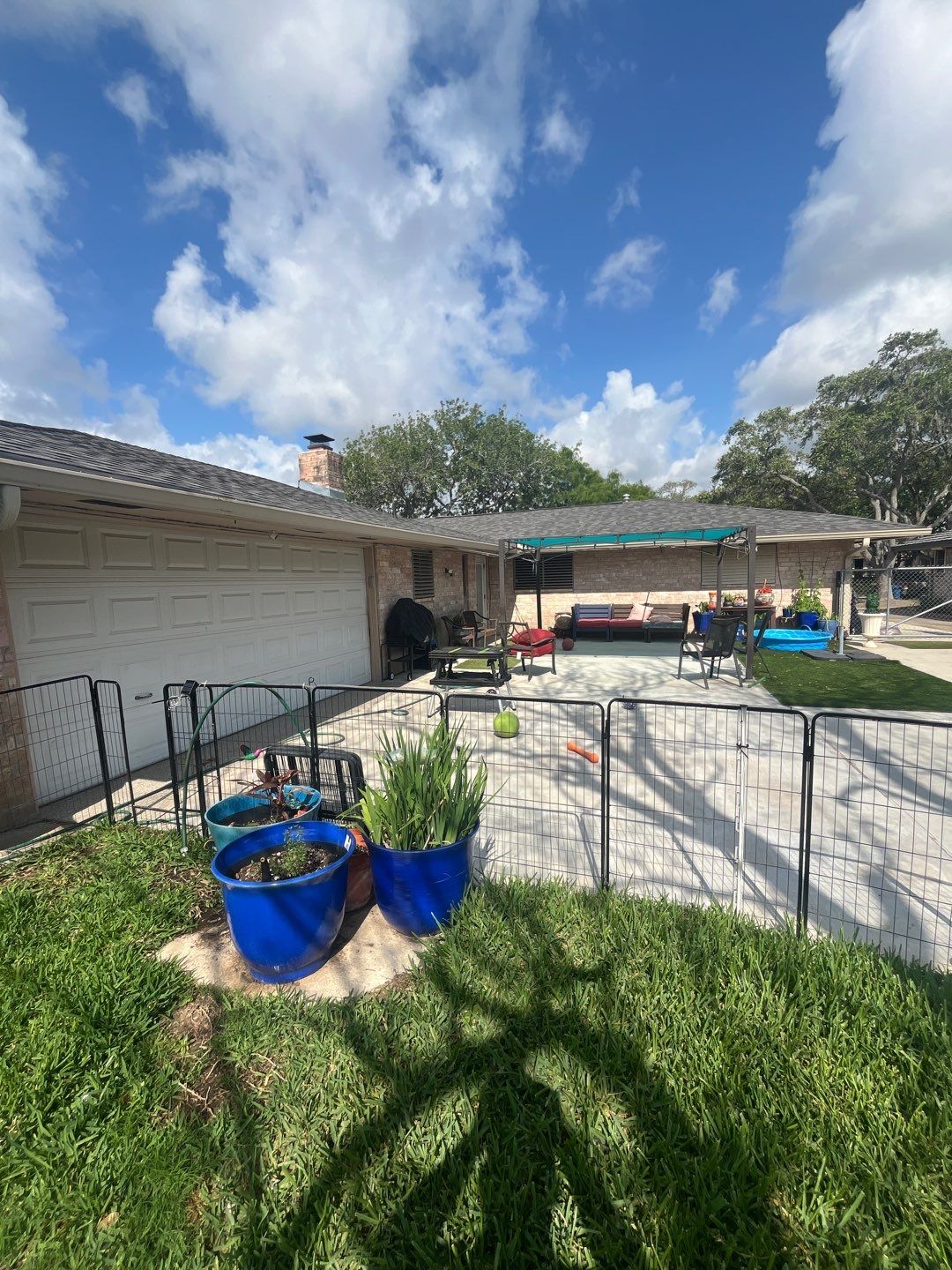 Colored Vinyl Windows to blend into brick by Bayfront Roofing and Construction
