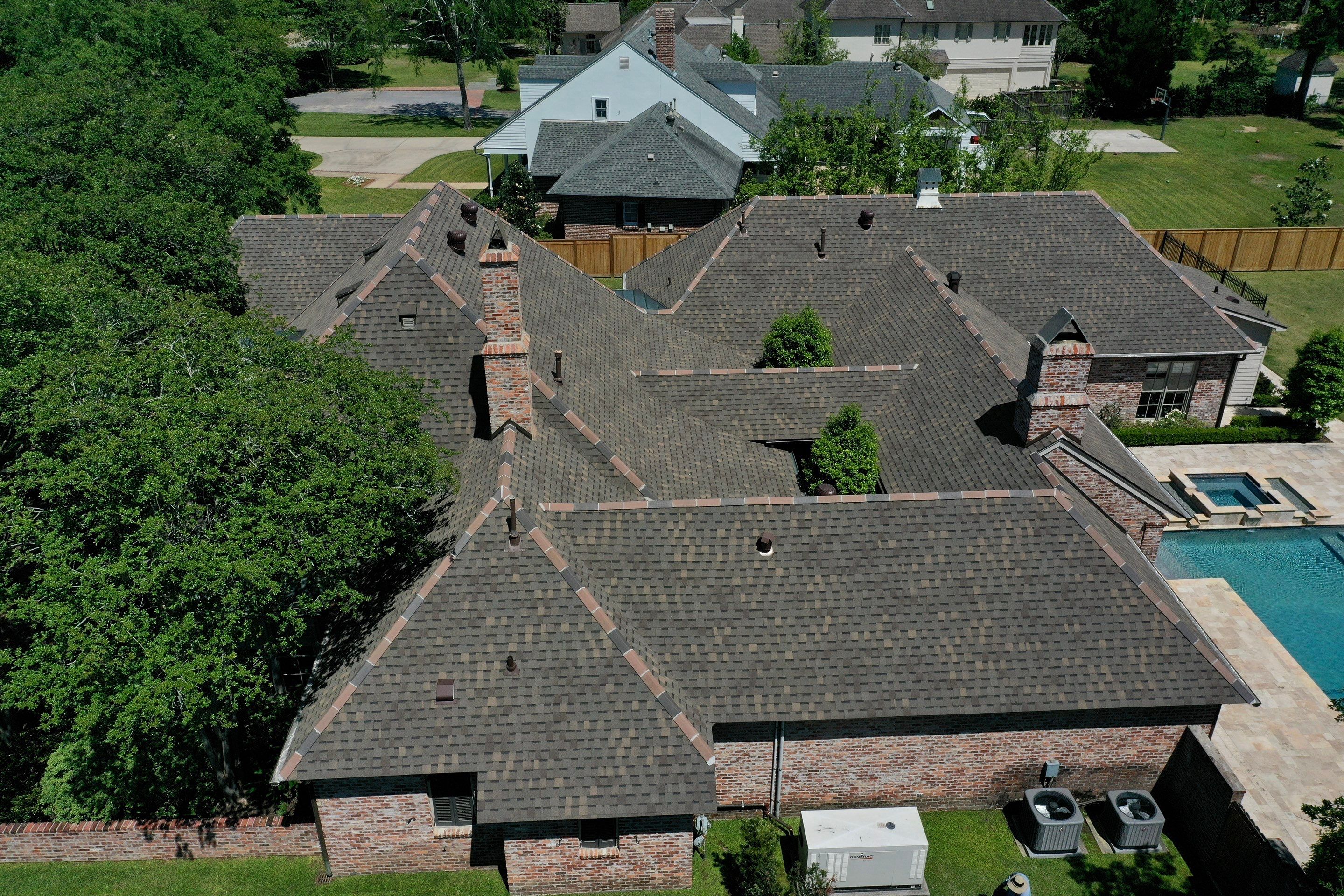 Atlas Pinnacle Pristine Weathered Shadow with Hecker V Ridge Tile by Top Team Construction