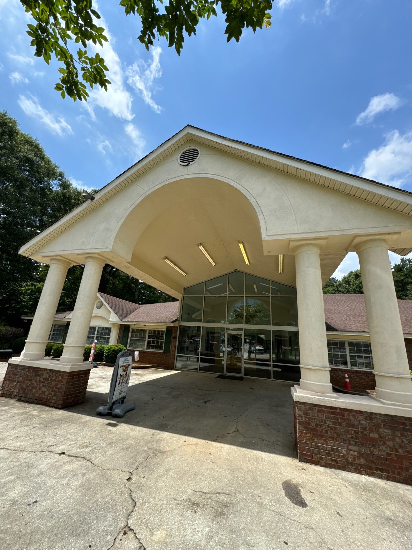 Commercial Exterior Brick and Stucco Painting in Fayetteville by Swift Home Renovations