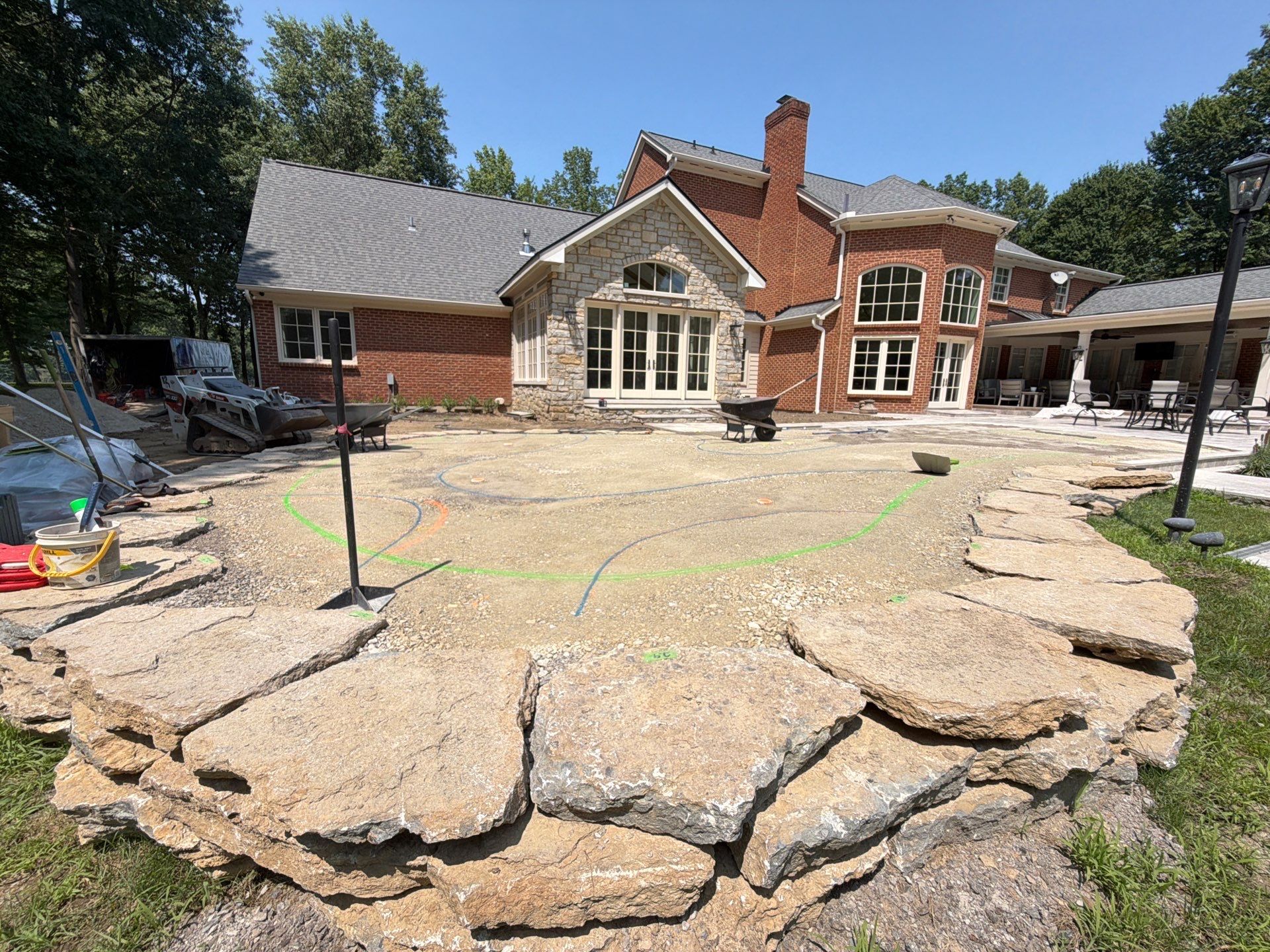 Custom Backyard Golf Green Accented by Flagstone Border in Morrow, OH by Southwest Greens Midwest