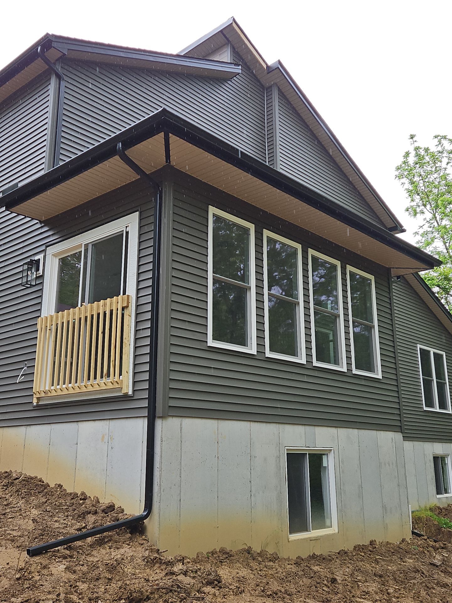 Gutter Installation using 5" Seamless Gutters and Downspouts by RoofX 