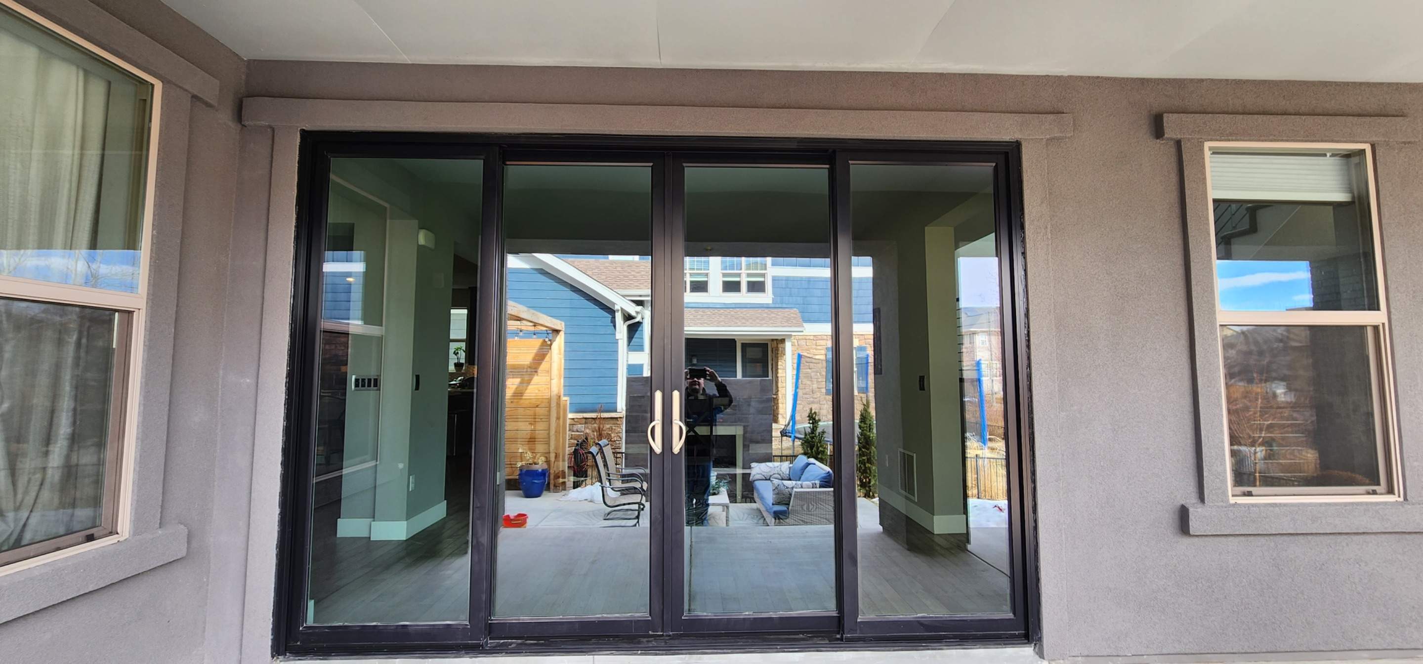 Open your space up to the outside! 4 Panel Patio door replacing 2 windows by 1st choice windows and siding