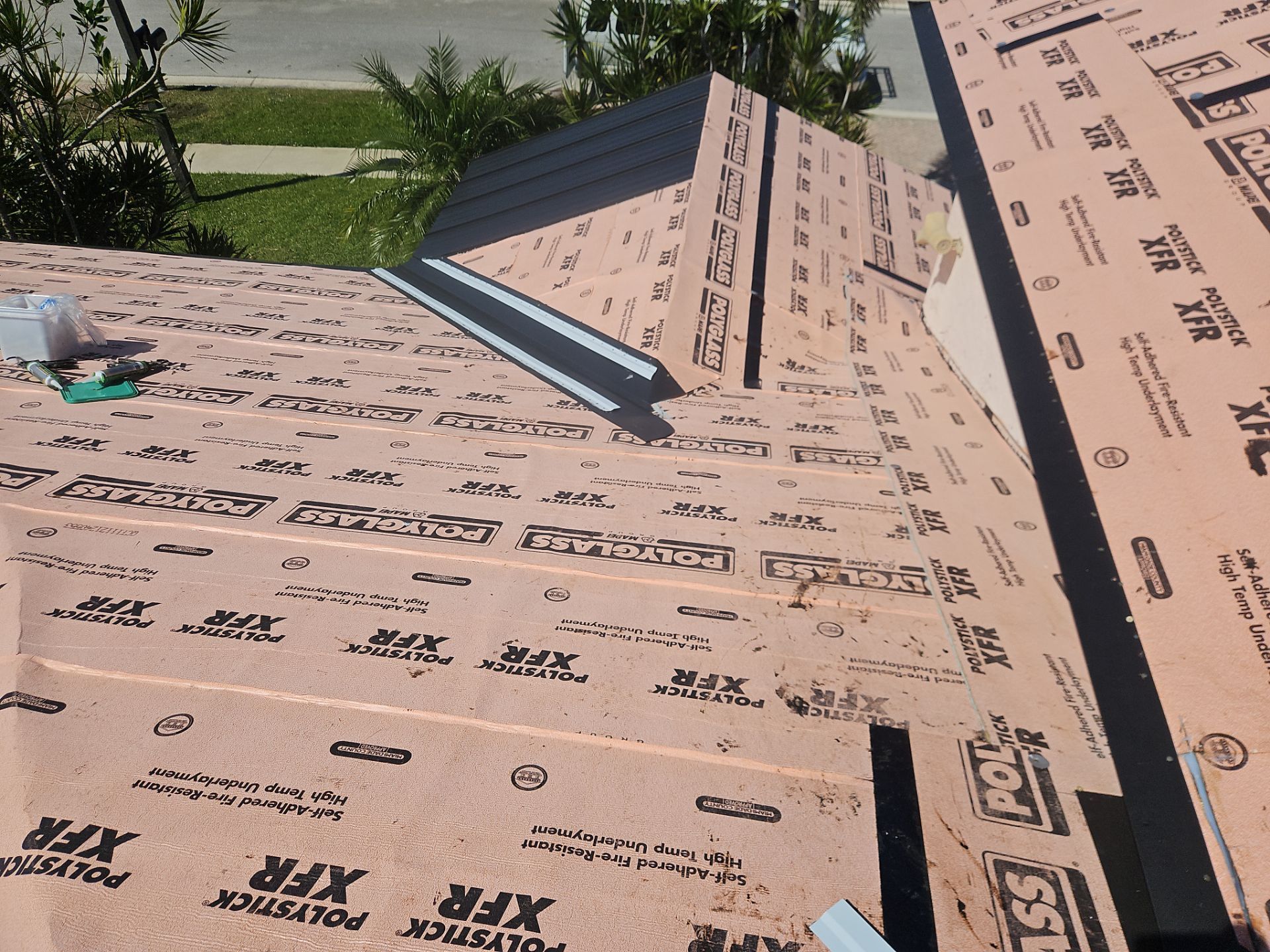 Residential Roofing Installation using 1" Nail strip metal roof by BLUES BROTHERS ROOFING