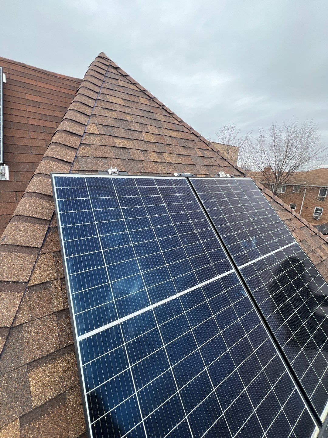 Brownwood Shingles by Reimagine Roofing