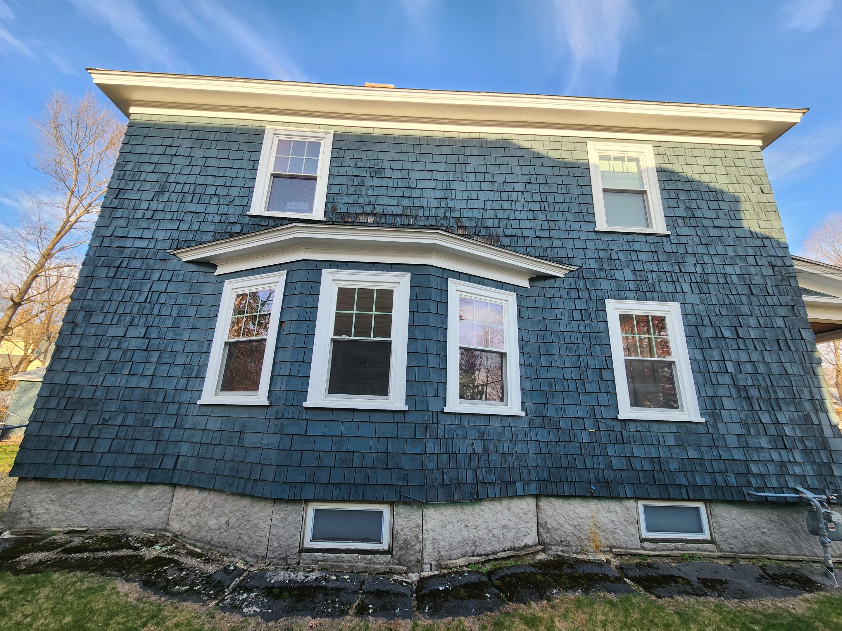 Siding replacement using cedar shakes by Freedom Handyman Services